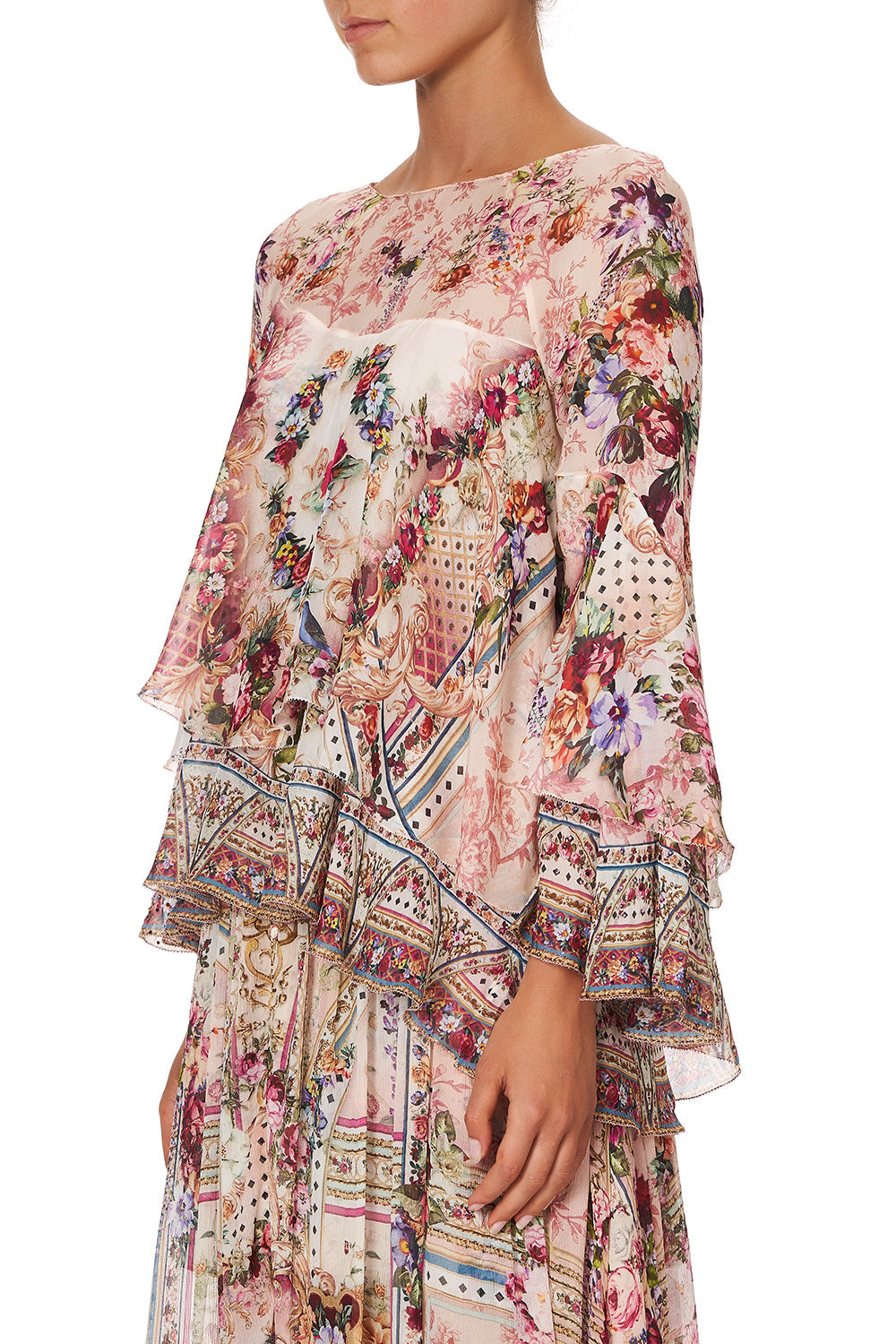 FLARED LAYERED BLOUSE SUMMONED BY A ROSE