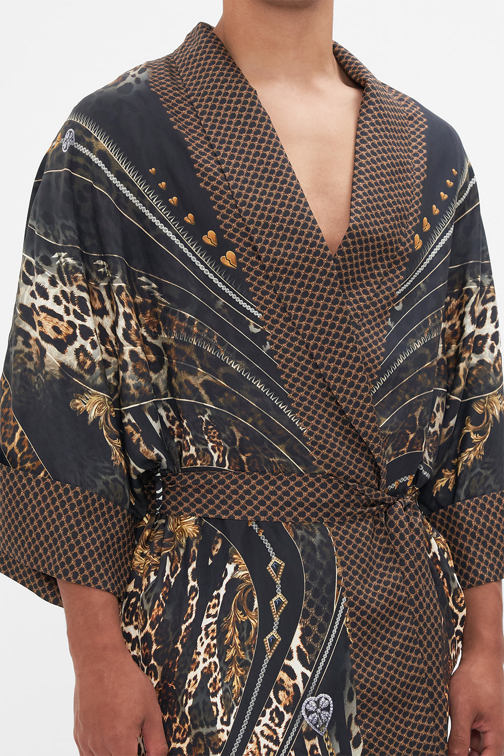 Detail view of model wearing Hotel Franks by CAMILLA mens silk robe in Chaos In The Cosmos animal print