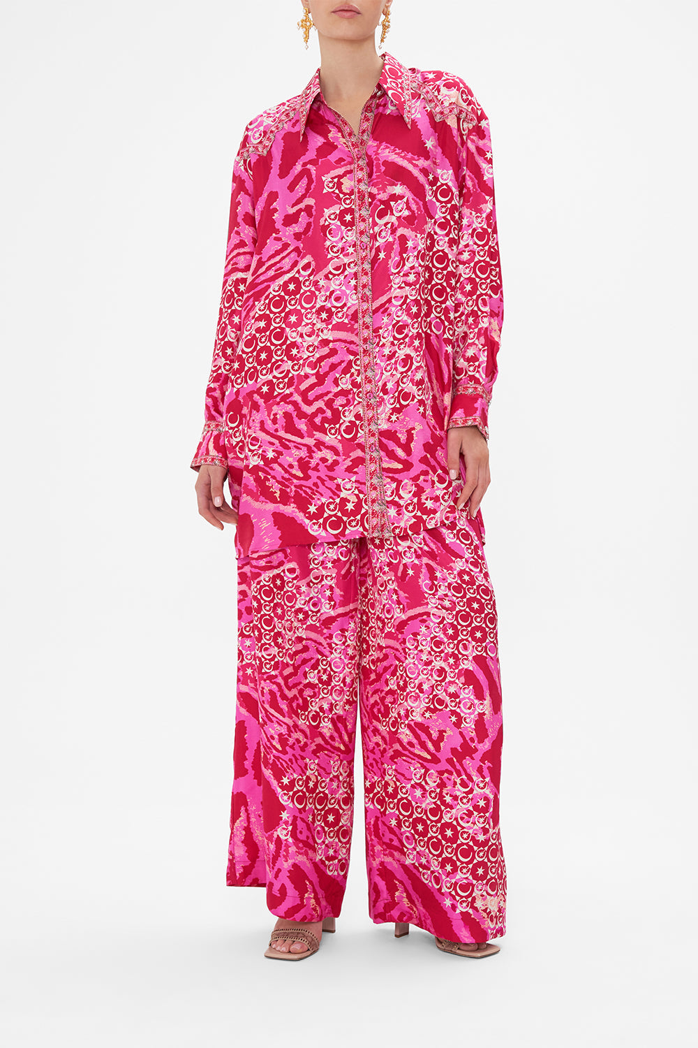 Styled front view of model wearing CAMILLA silk shirt in Song Of Sacrifice print