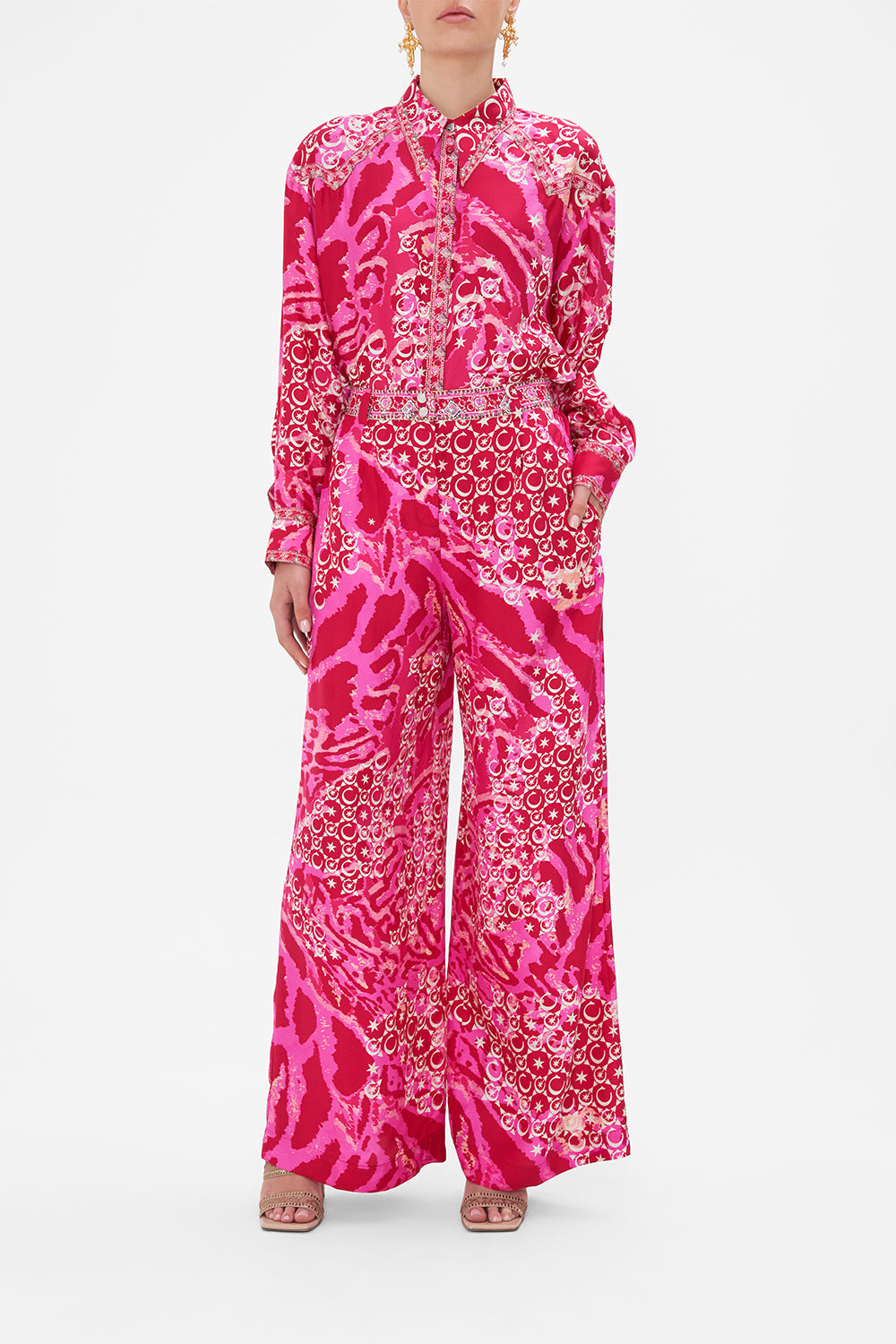 Front view of model wearing CAMILLA silk palazzo pants in Song Of Sacrifice print