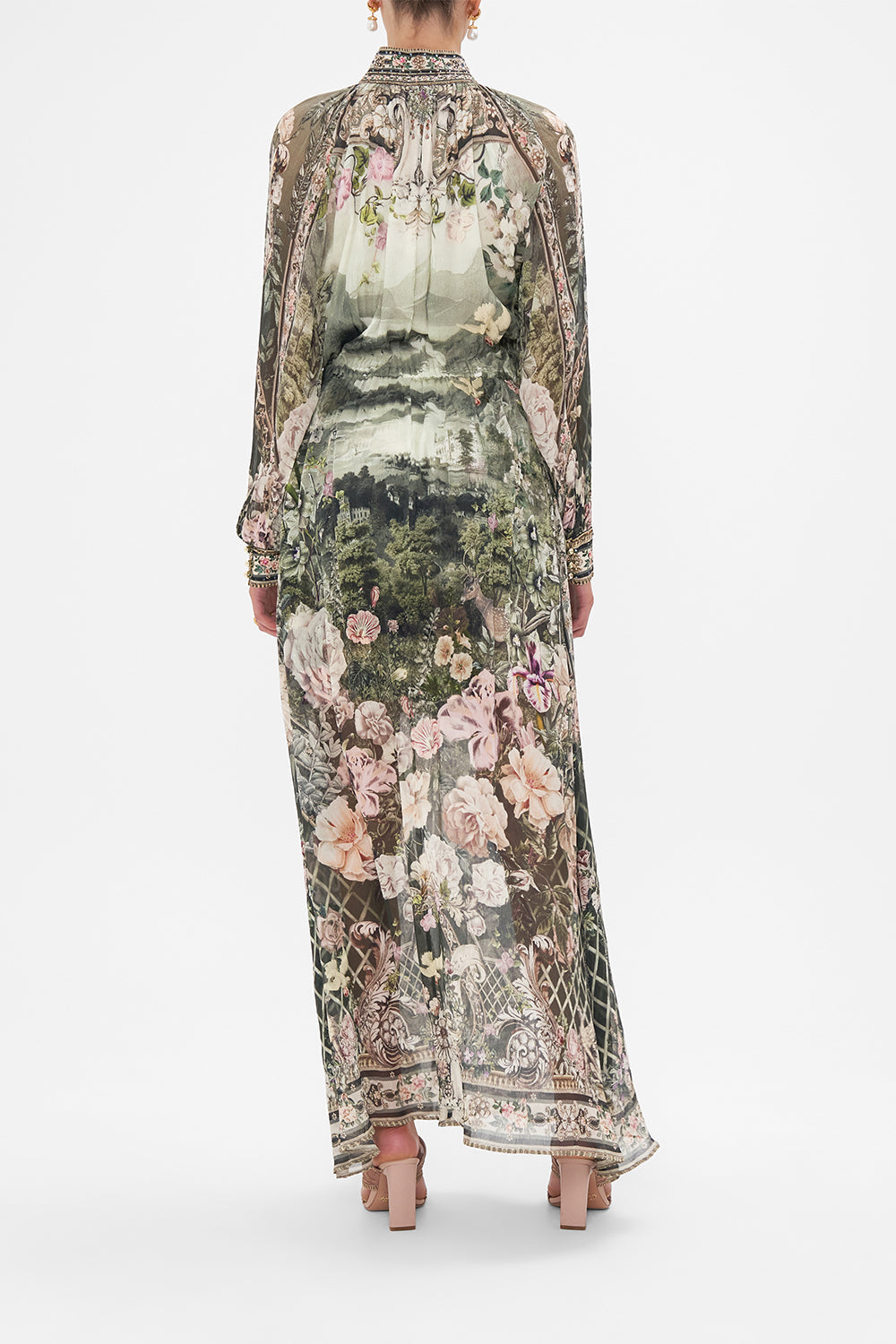 Back view of model wearing CAMILLA green silk floral maxi dress in Garden Of Good Fortune print