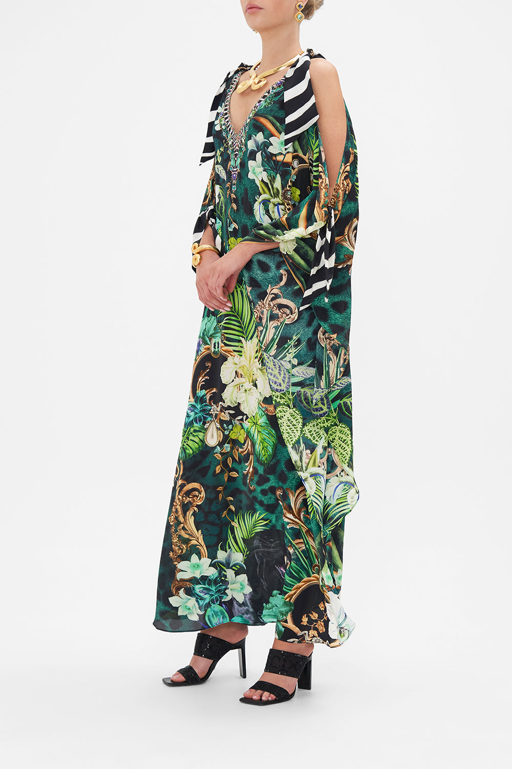 Side view of model wearing CAMILLA silk kaftan in Sing My Song print