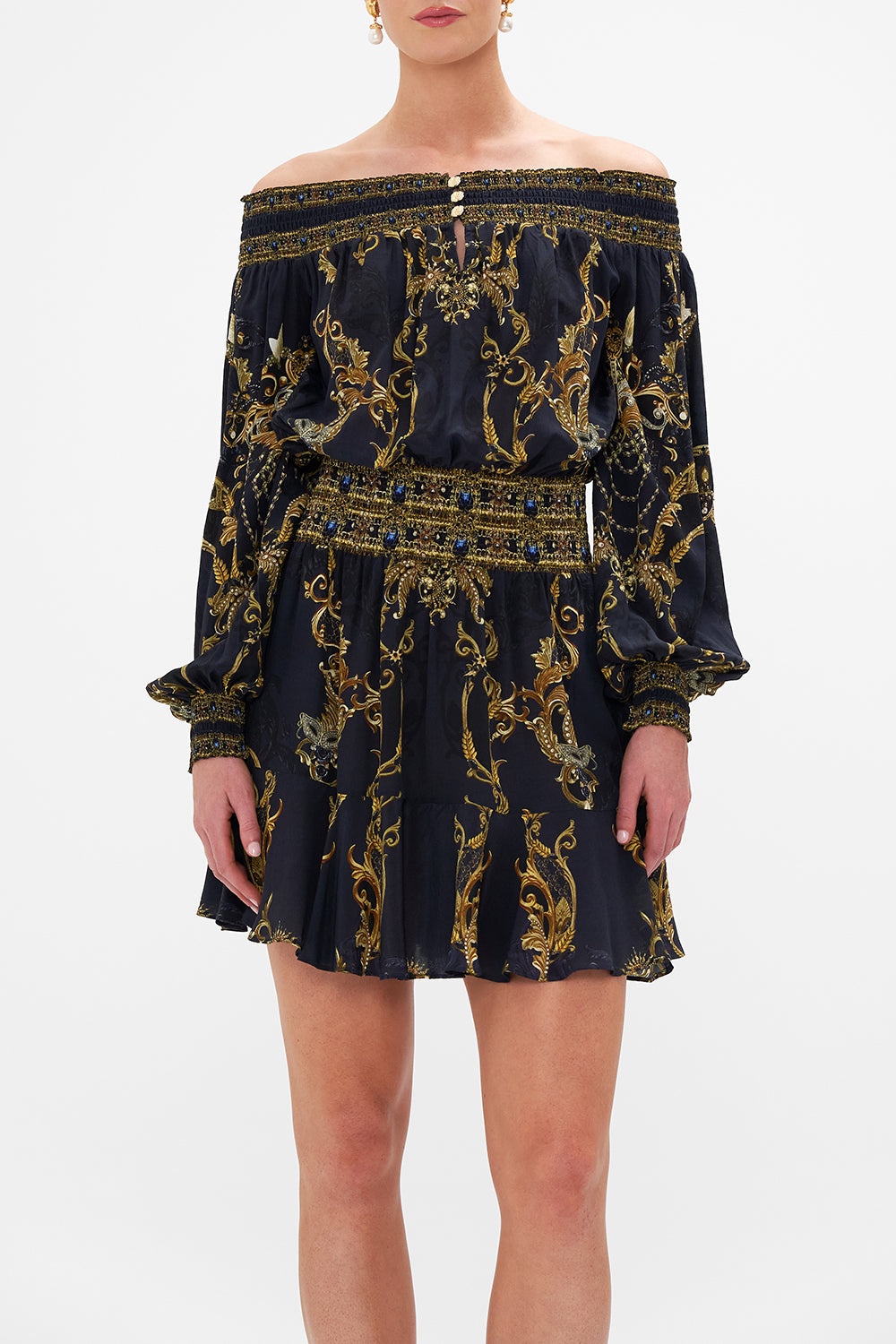 Crop view of model wearing CAMILLA off the shoulder dress in Moonlight Melodies print