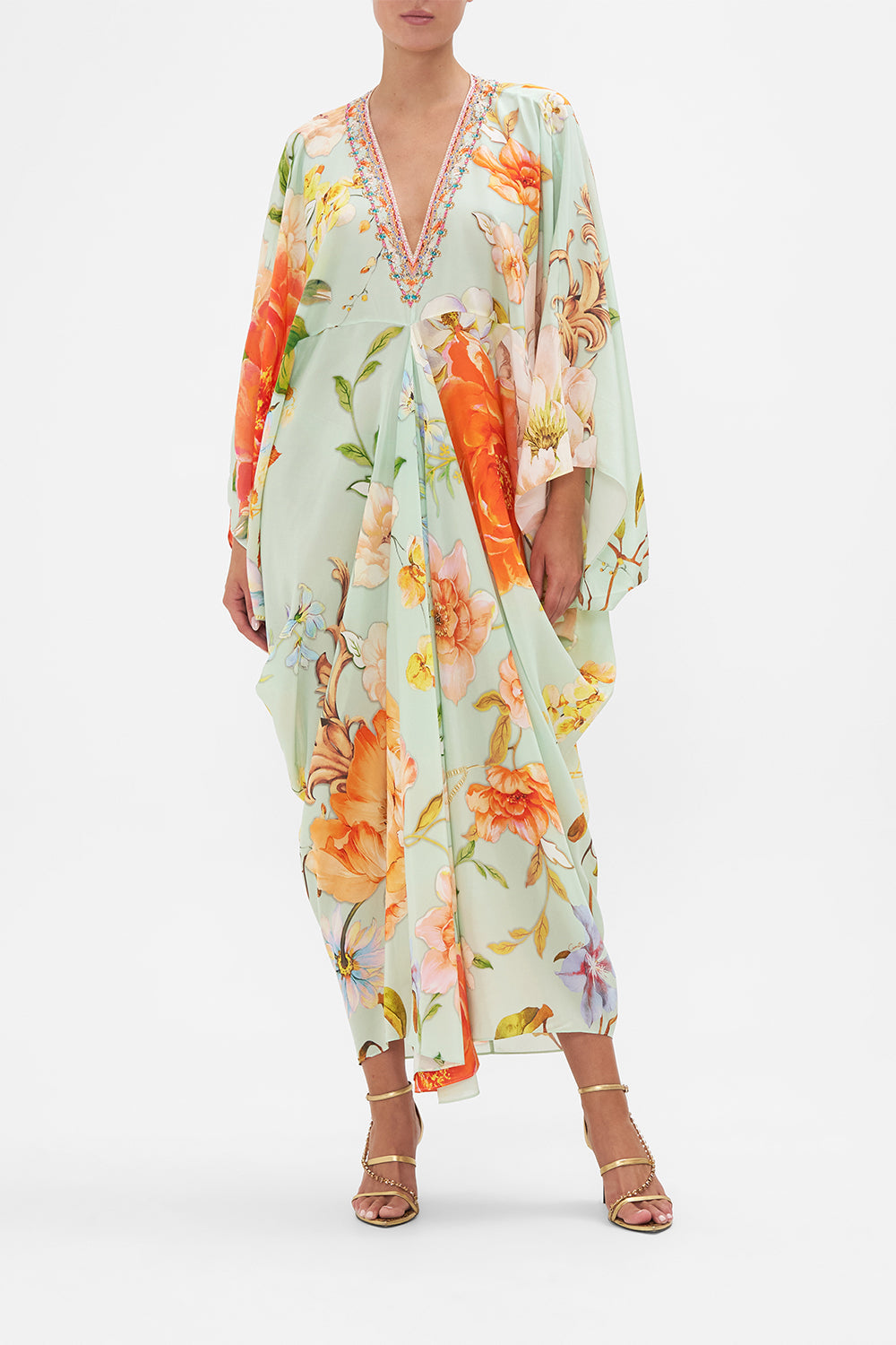 Front view of model wearing CAMILLA floral silk kaftan in Talk The Walk print
