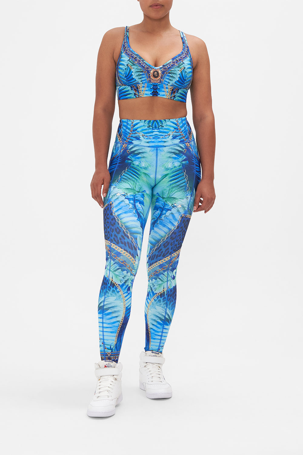 Front view of model wearing CAMILLA leggings in Song of The Jungle print