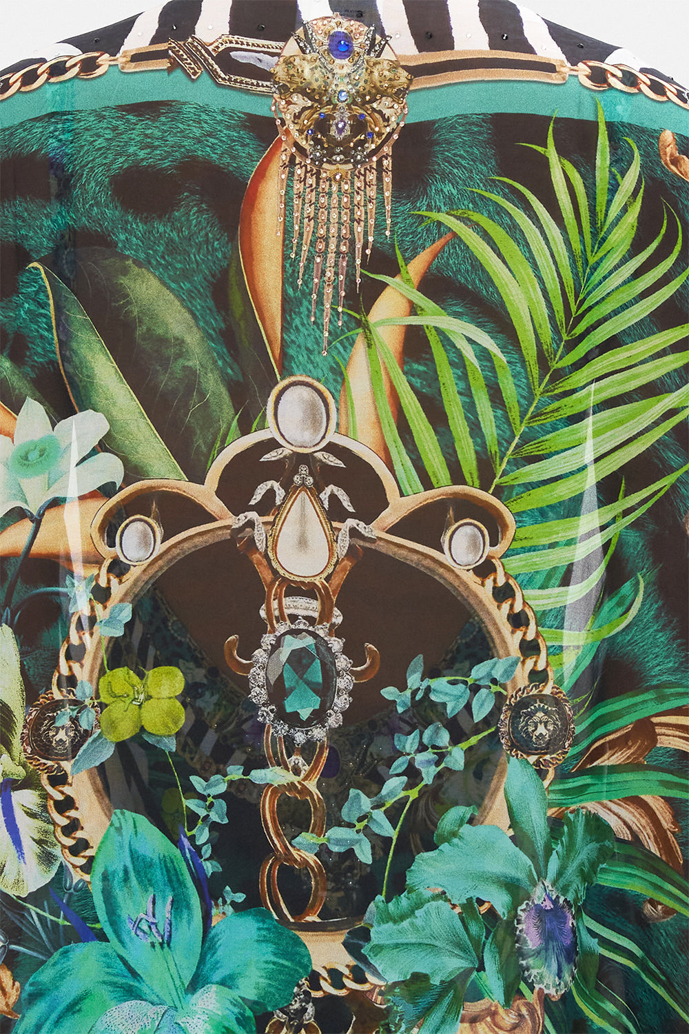 Detail view of model wearing CAMILLA silk shrug in Sing My Song print