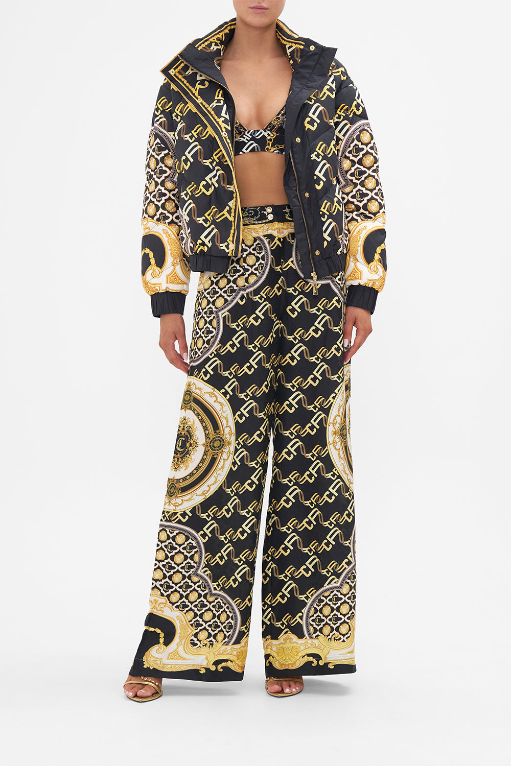 Front view of model wearing CAMILLA Puffer jacket in Tether Me Not print