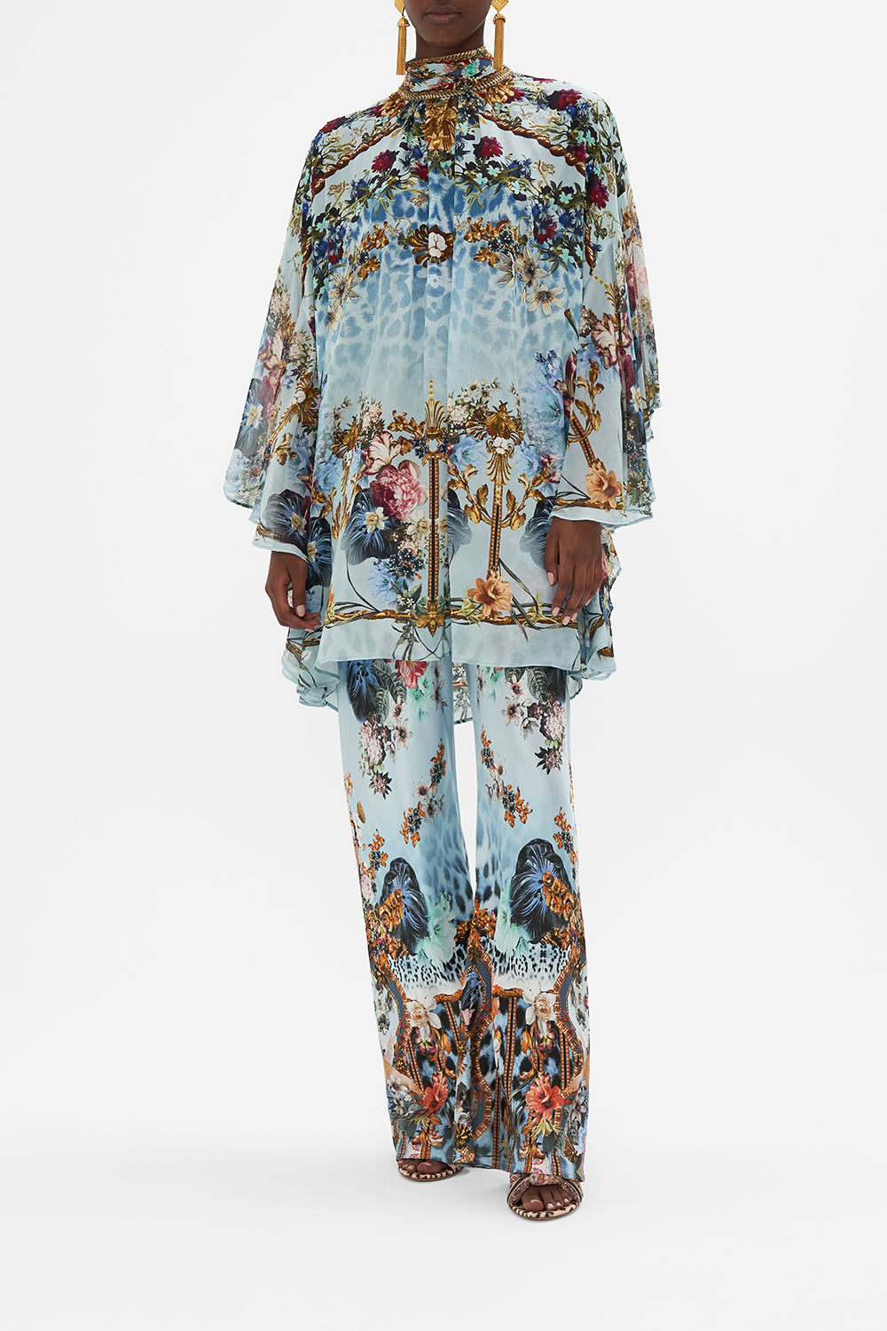 Front view of model wearing CAMILLA silk high neck blouse in Letters To Leo print