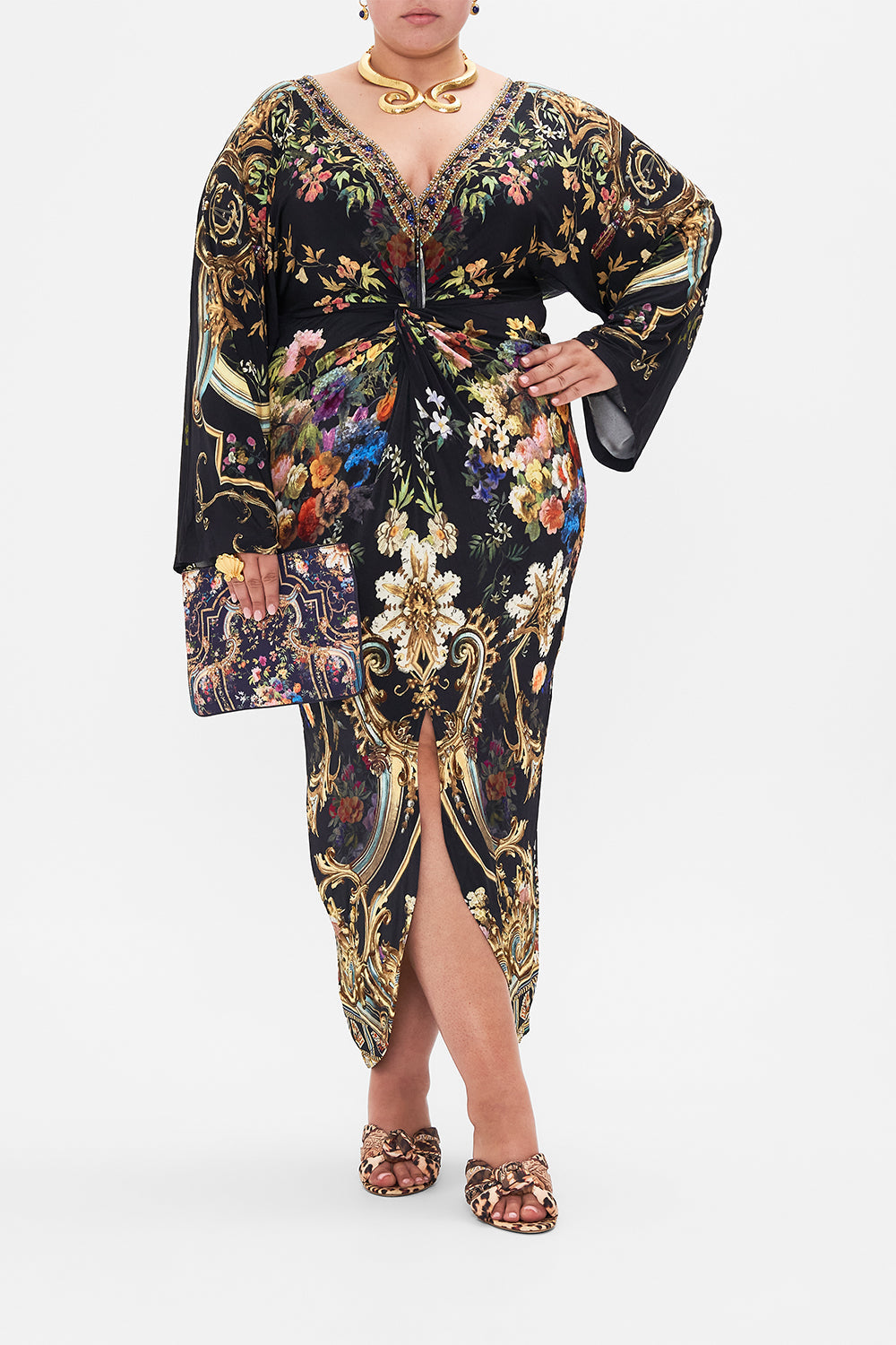 Front view if curvy model wearing CAMILLA plus size floral maxi dress in Play Your Cards Right print