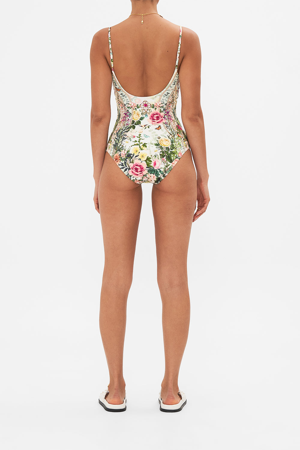Back view of model wearing CAMILLA designer one piece swimsuit in Renaissance Romance print