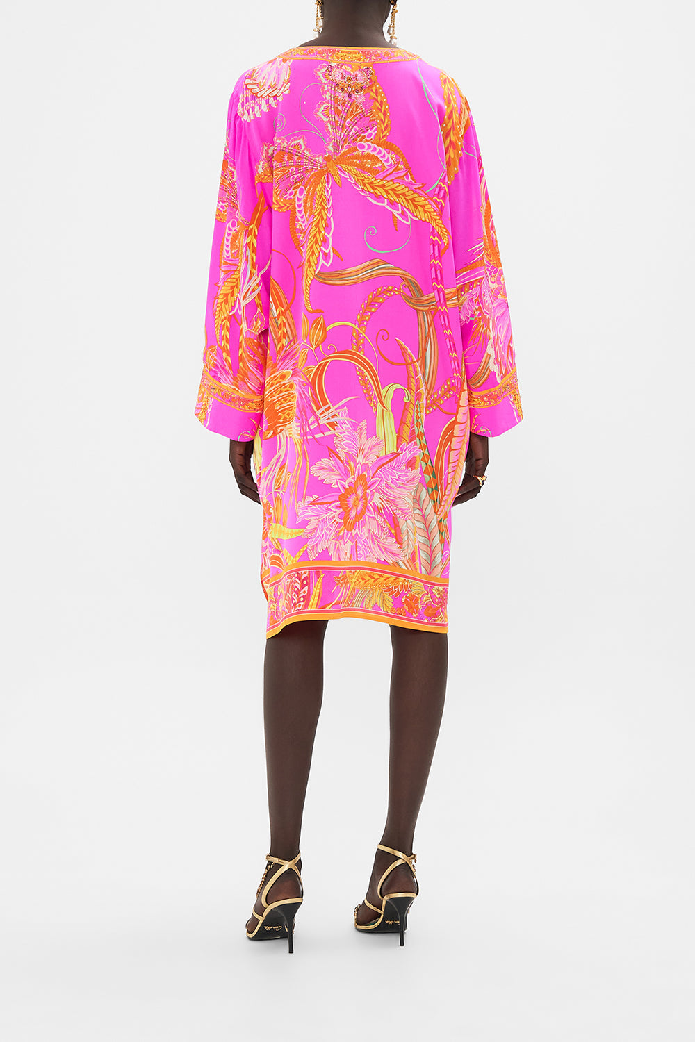 Back view of model wearing CAMILLA designer kaftan in A Heart That Flutters print