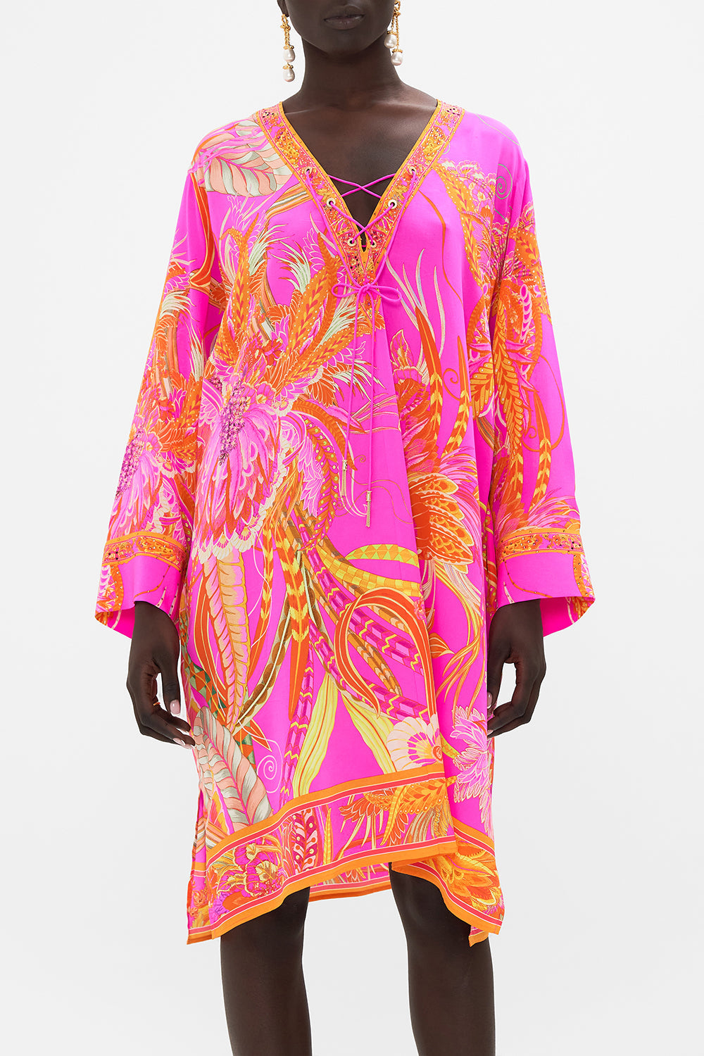 Crop view of model wearing CAMILLA designer kaftan in A Heart That Flutters print