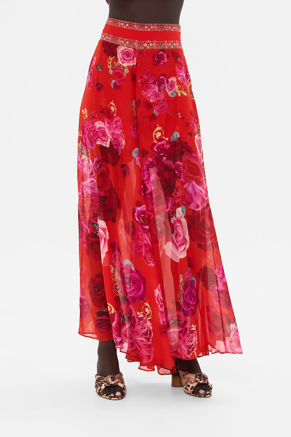 Crop view of model wearing CAMILLA silk palazzo pant in An Italian Rosa print