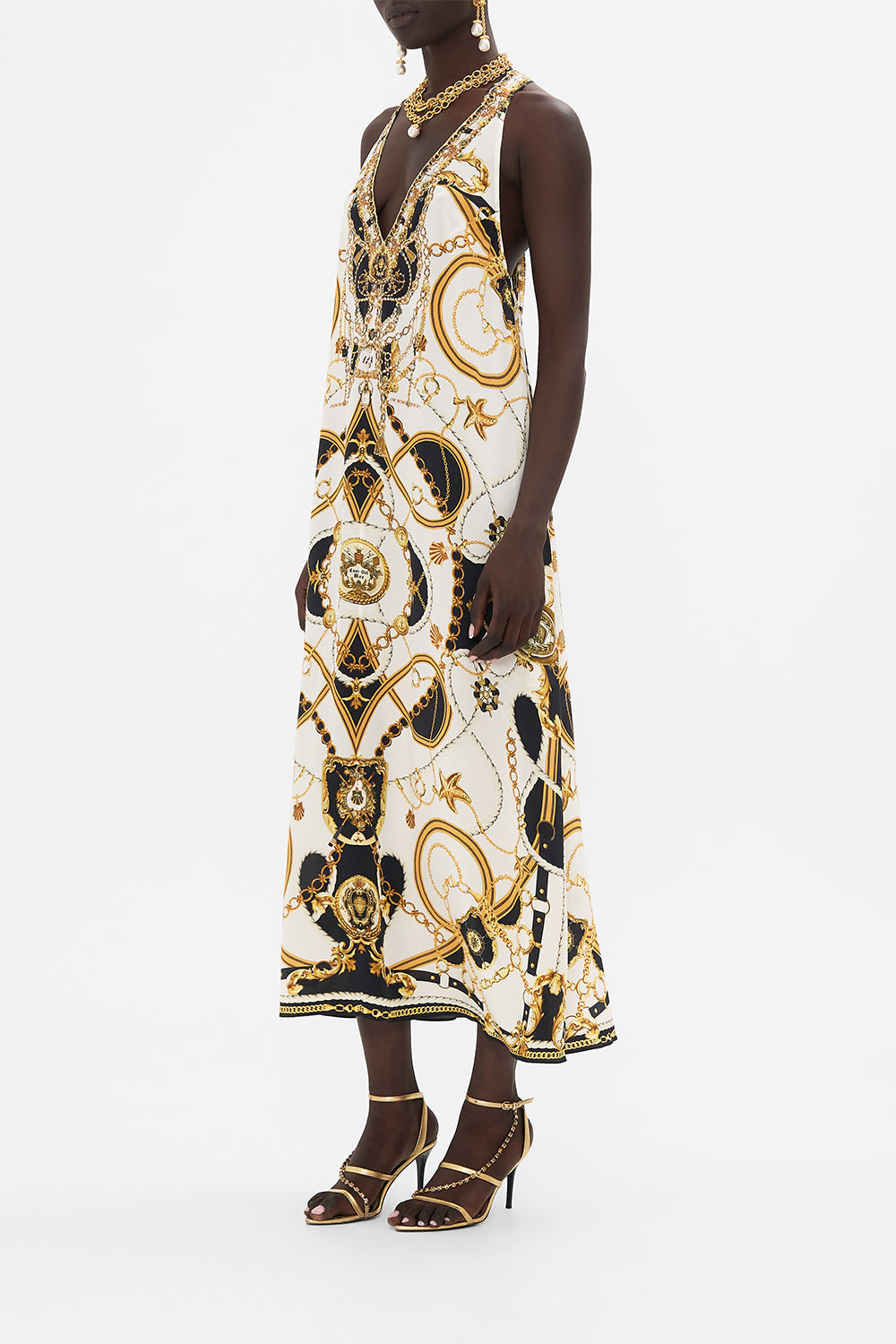 Side view of model wearing CAMILLA reacerback dress in Sea Charm print