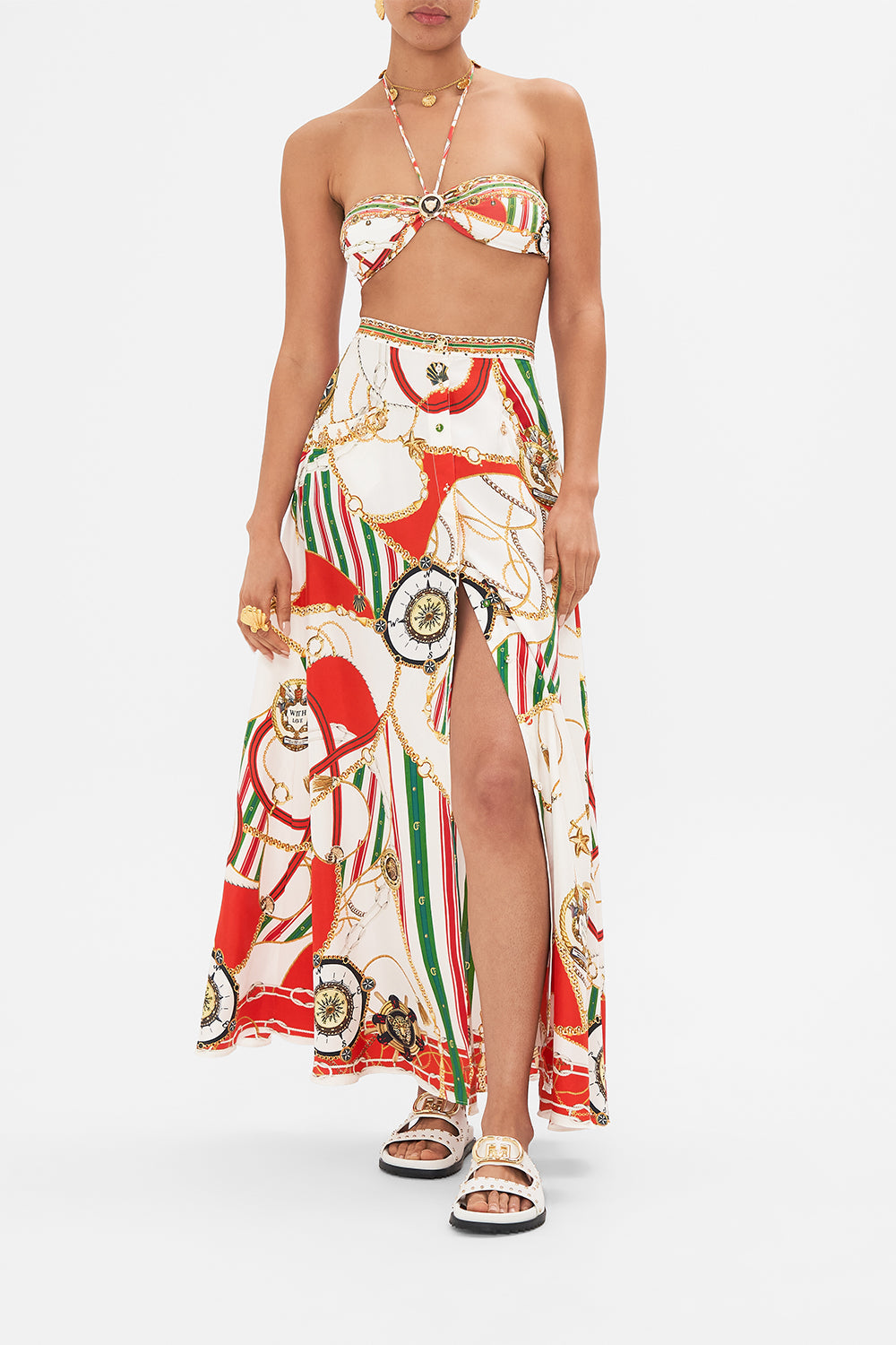 Detail view of model wearing CAMILLA button through skirt in Saluti Summertime print