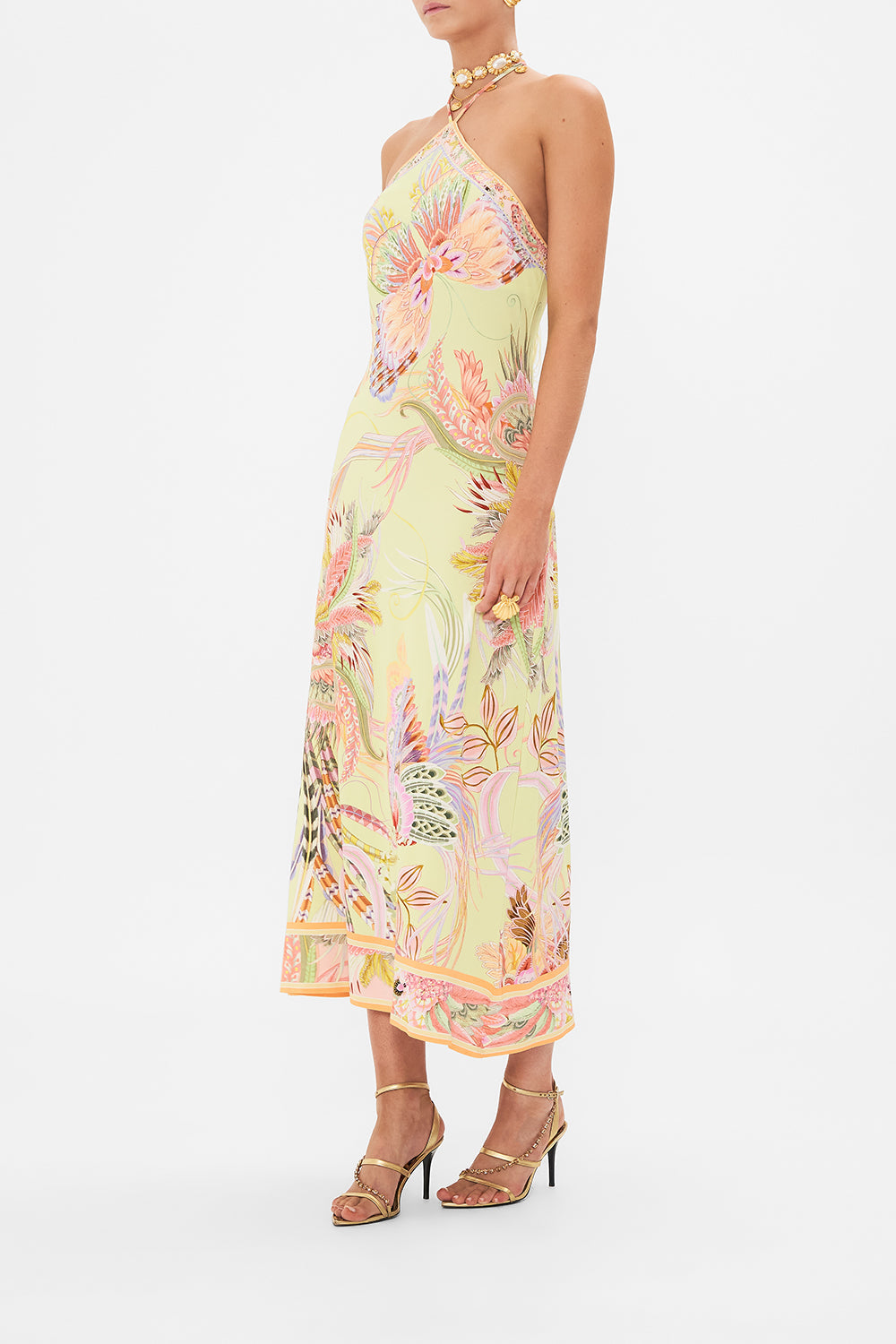 Side view of model wearing CAMILLA jersey maxi dress in Cosmic Tuscan print