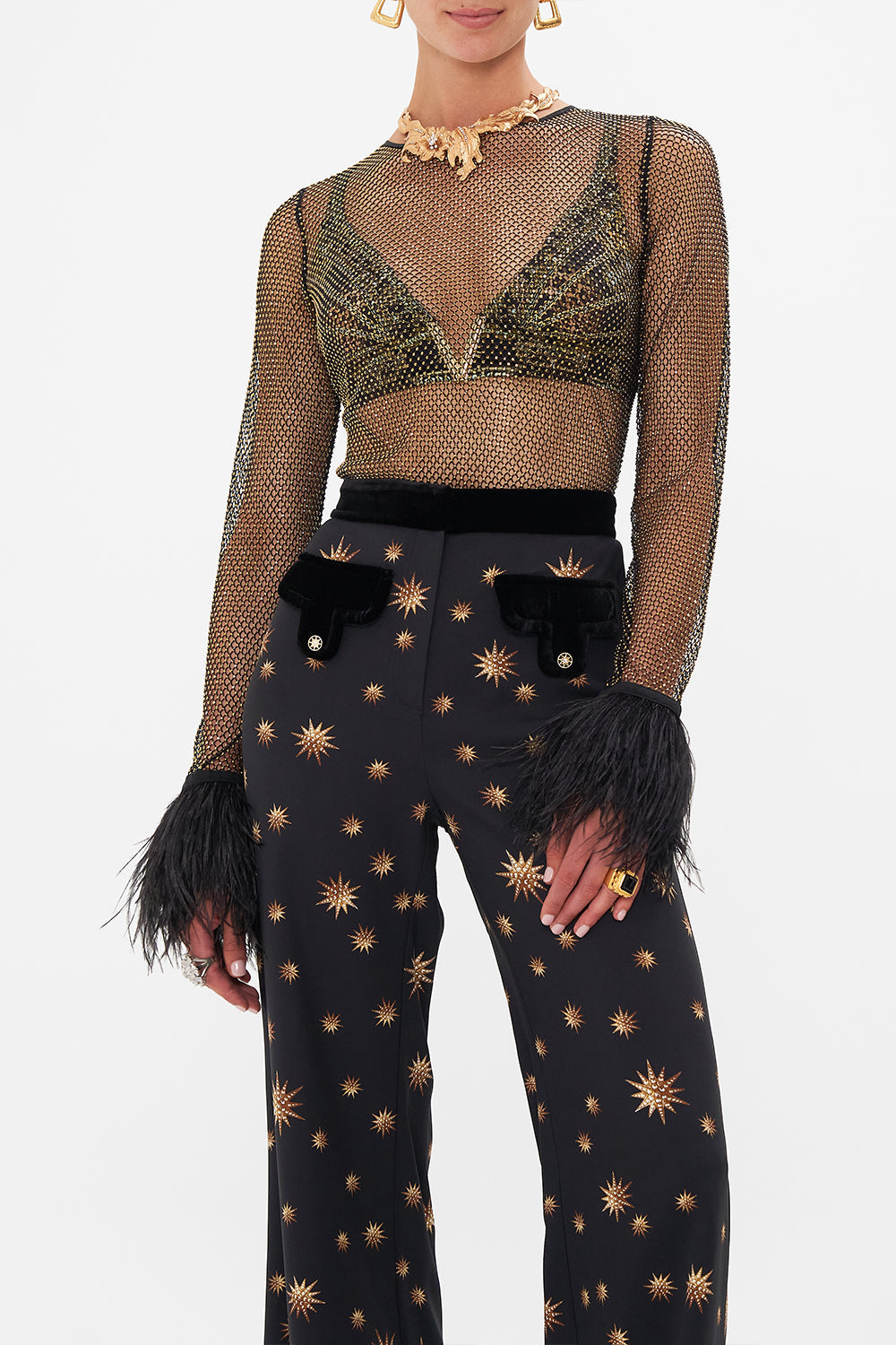 Crop view of model wearing CAMILLAdesigner mesh top in Soul Of A Star Gazer print