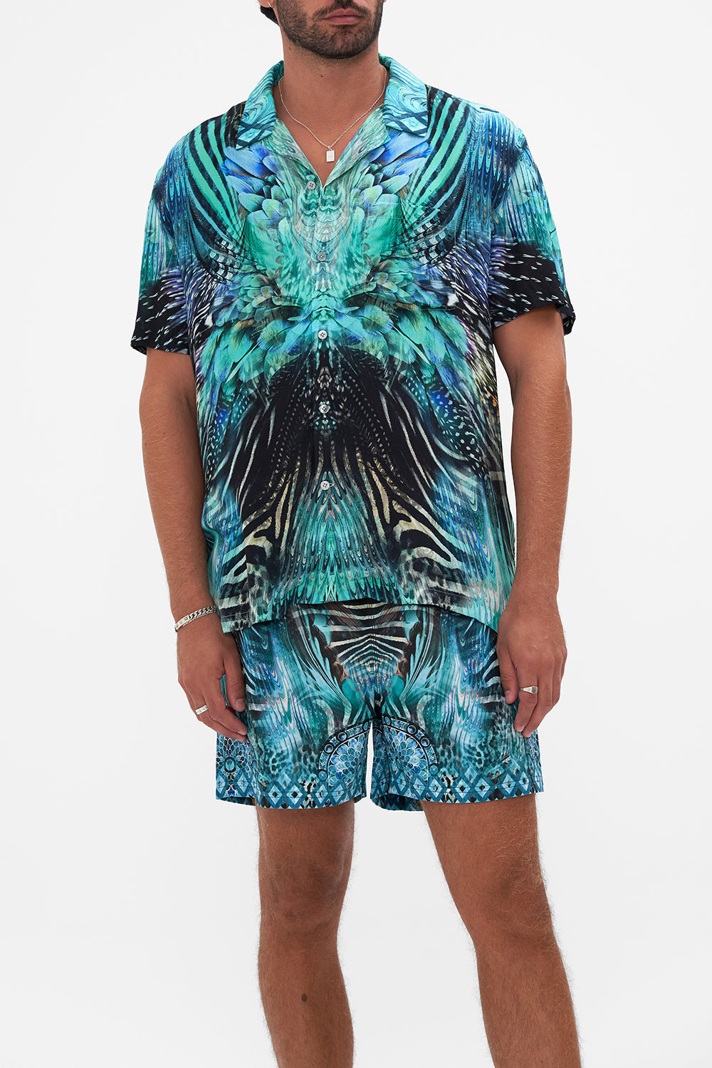 Crop of model wearing Hotel Franks By CAMILLA mens short sleeve camp collared shirt in Azure Allure