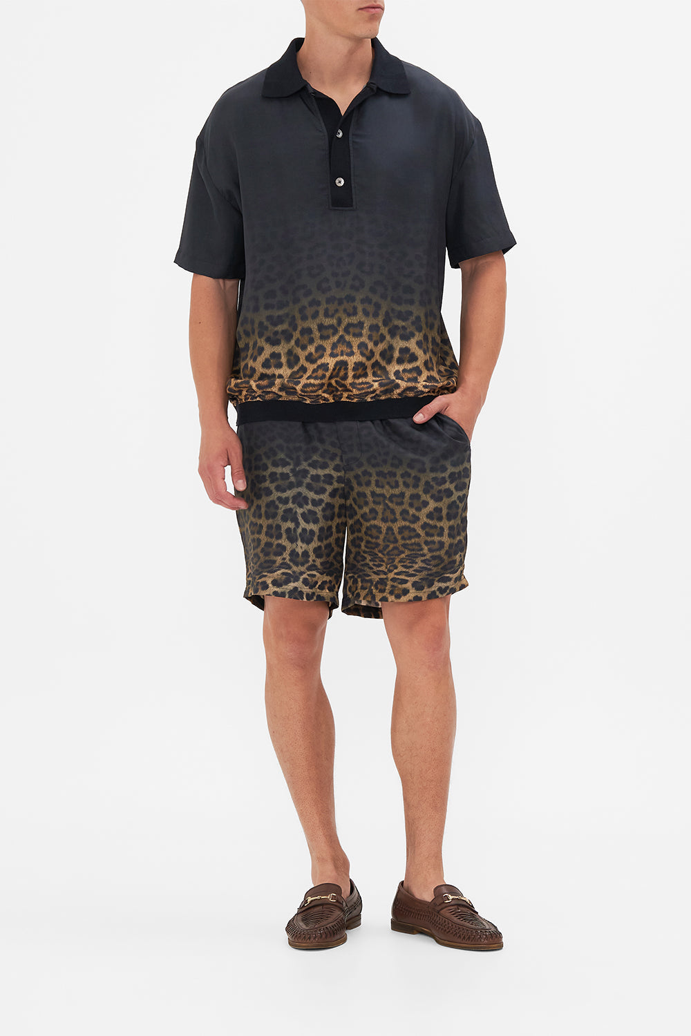 Front view of model wearing Hotel Franks By CAMILLA mens polo shirt in Masked At Moonlight print