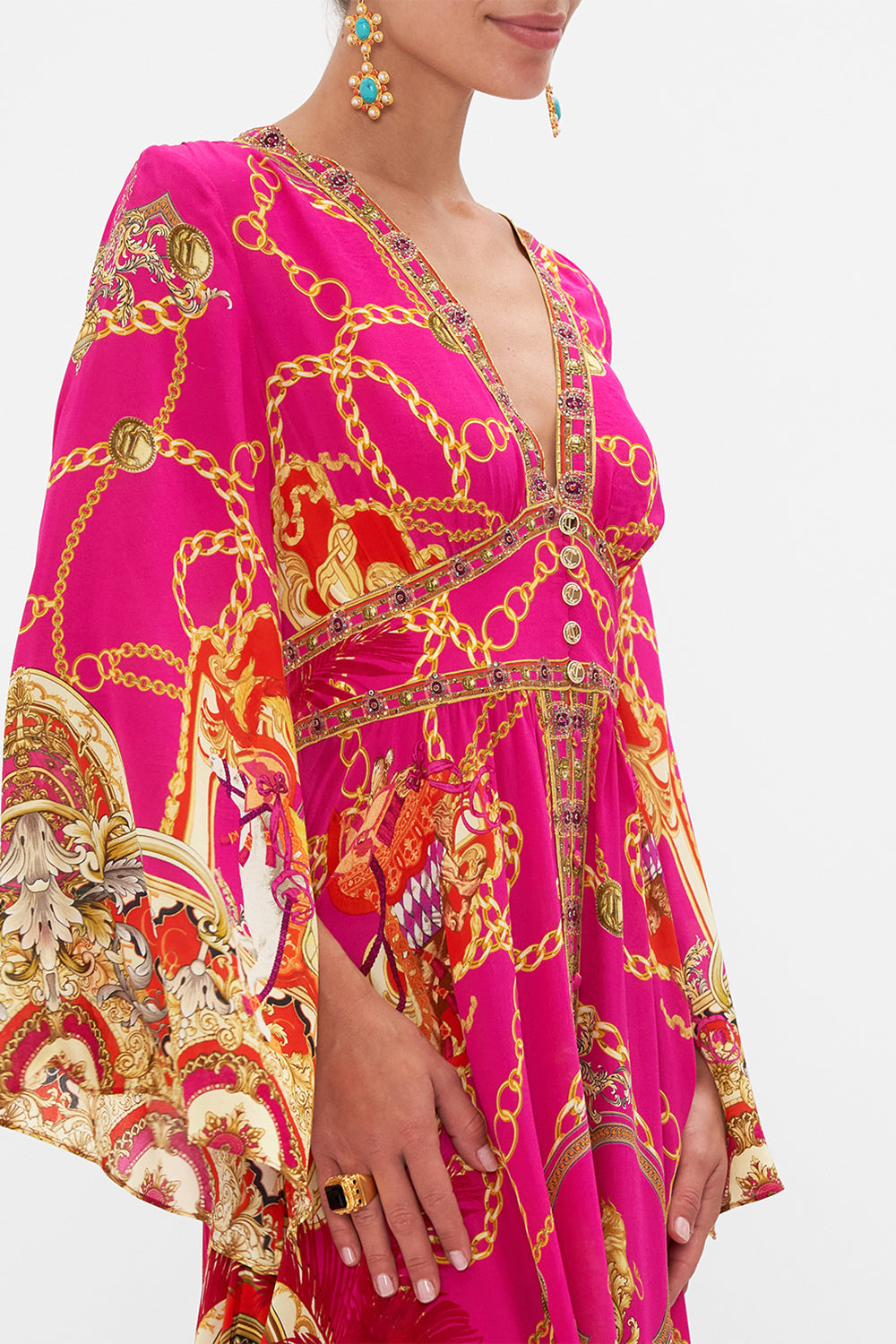Crop view of model wearing CAMILLA pink silk maxi dress in Wild And Running print