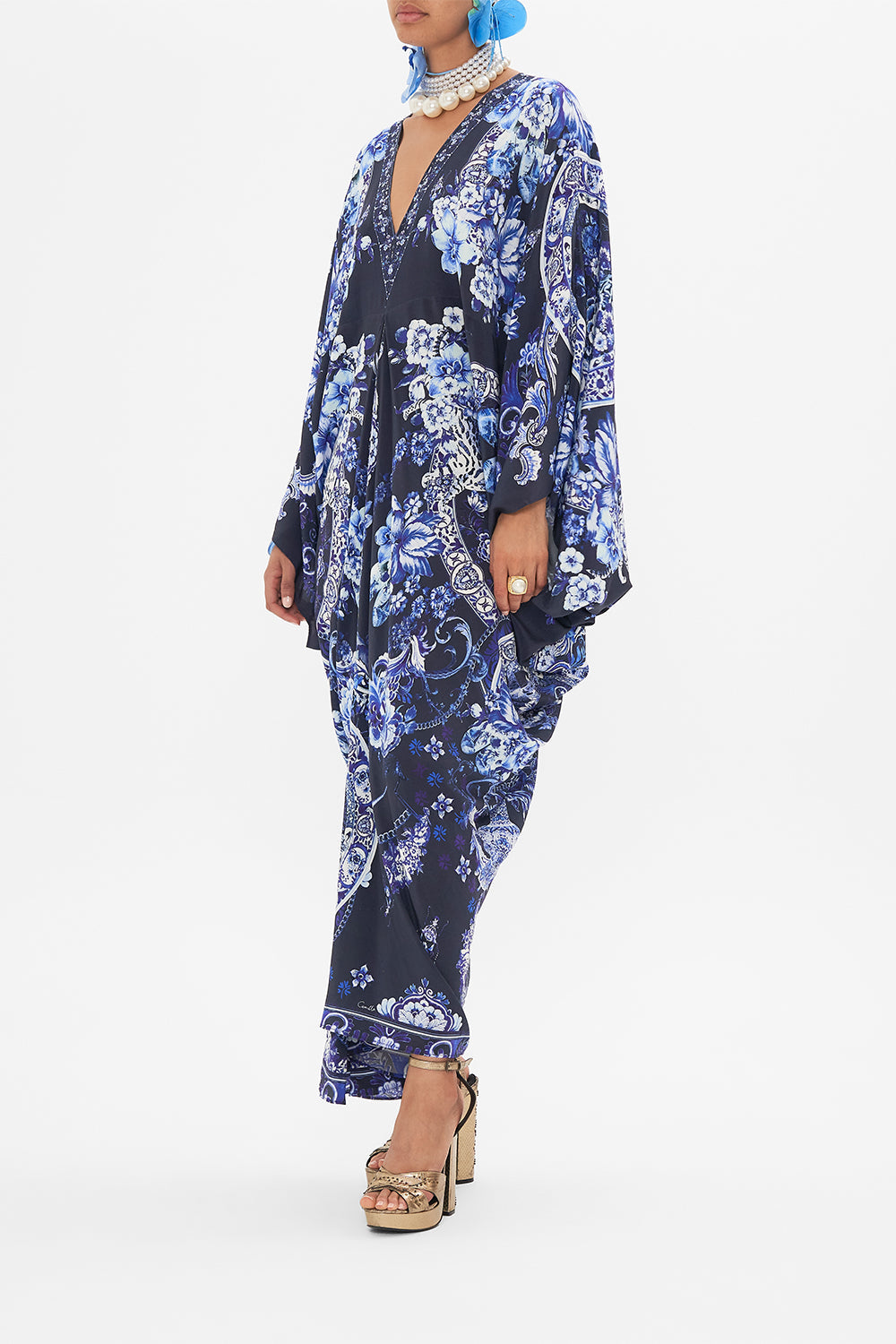 Side view of model wearing CAMILLA silk kaftan in Delft Dynasty print