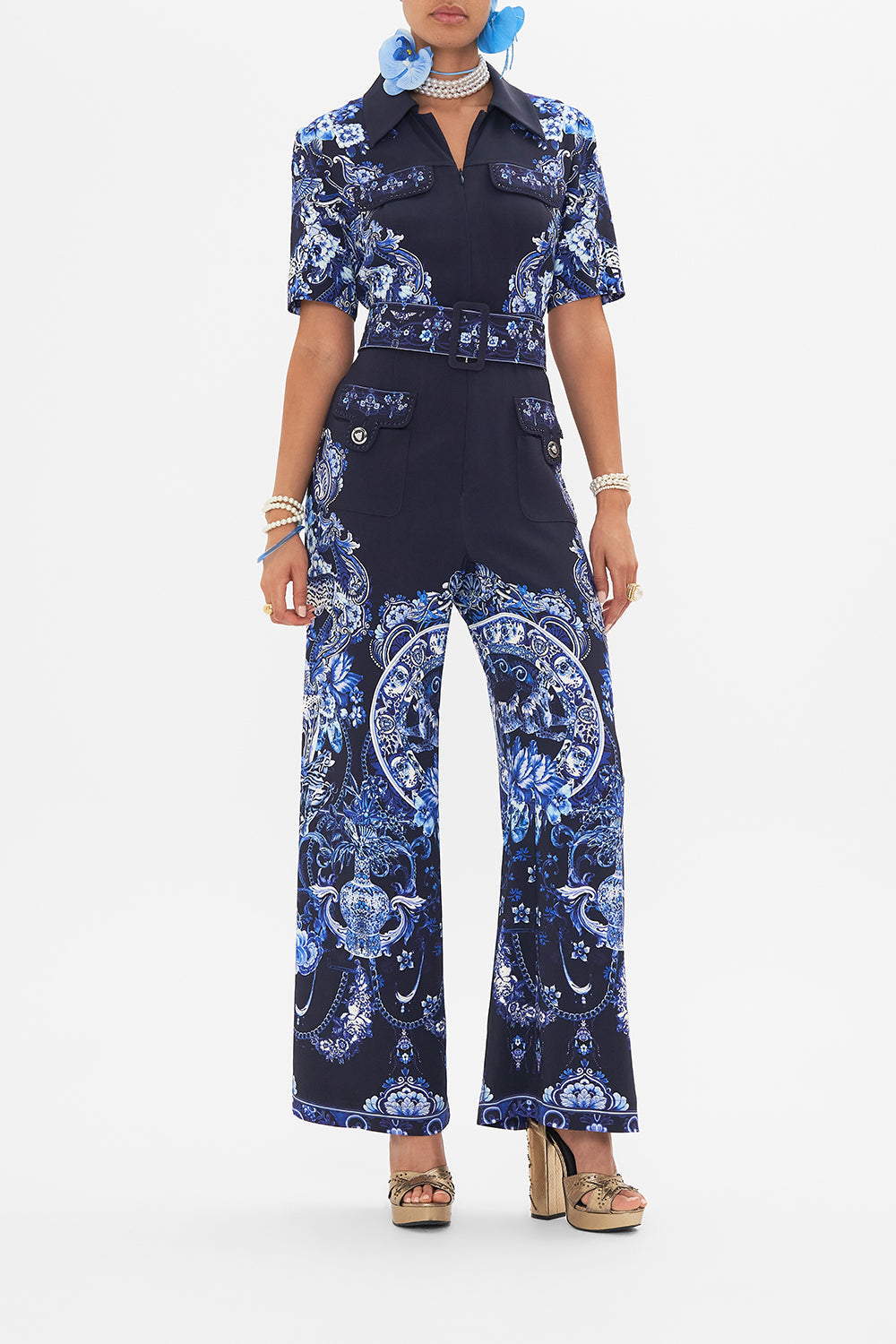 Front view of model wearing CAMILLA jumpsuit in Delft Dynasty print