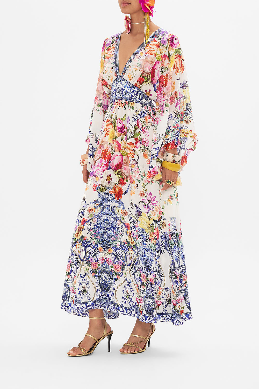 Side view of model wearing CAMILLA silk dress in Dutch is Life print