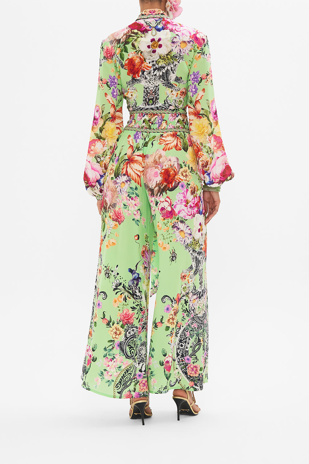 Back view of model wearing CAMILLA wrap shirt in Porcelain Dream print