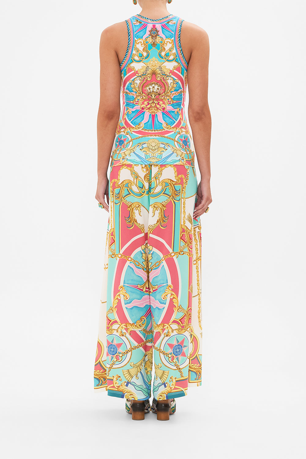 Back view of model wearing CAMILLA jersey tank top in Sail Away With Me print