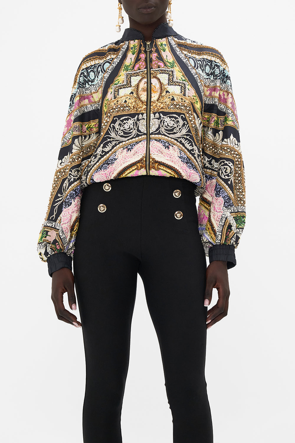Crop view of model wearing CAMILLA silk bomber jacket in Florence Field Day Print