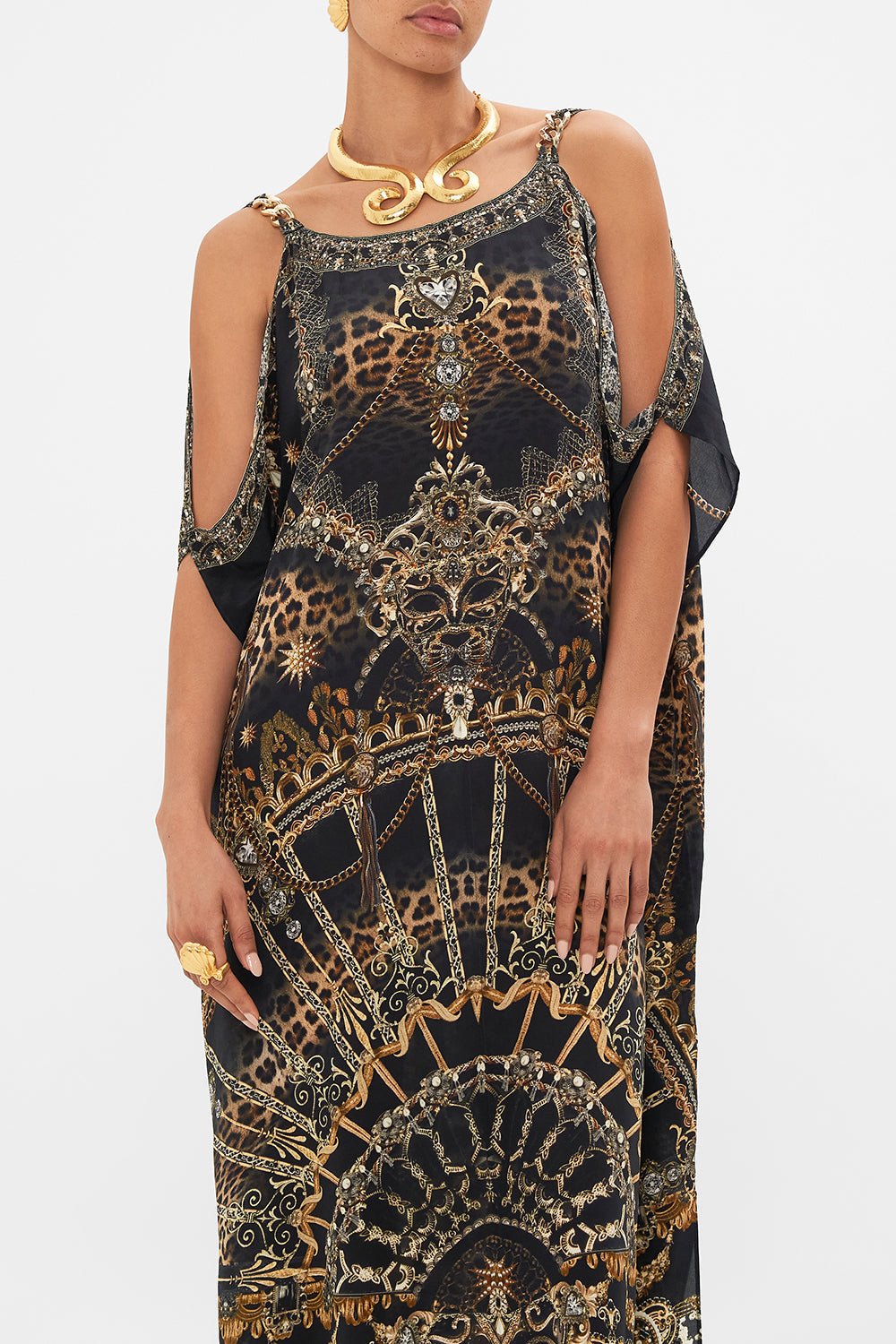 Crop view of model wearing CAMILLA silk kaftan with hardware in Masked at Moonlight print