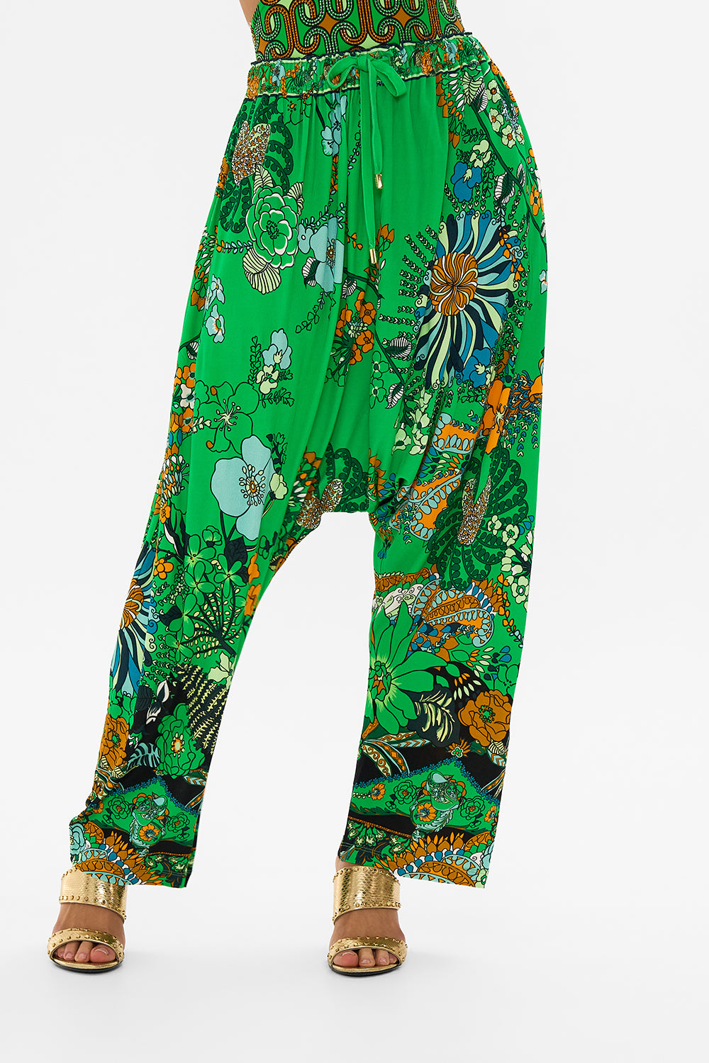 CAMILLA green draped jersey pant in Good Vibes Generation print.