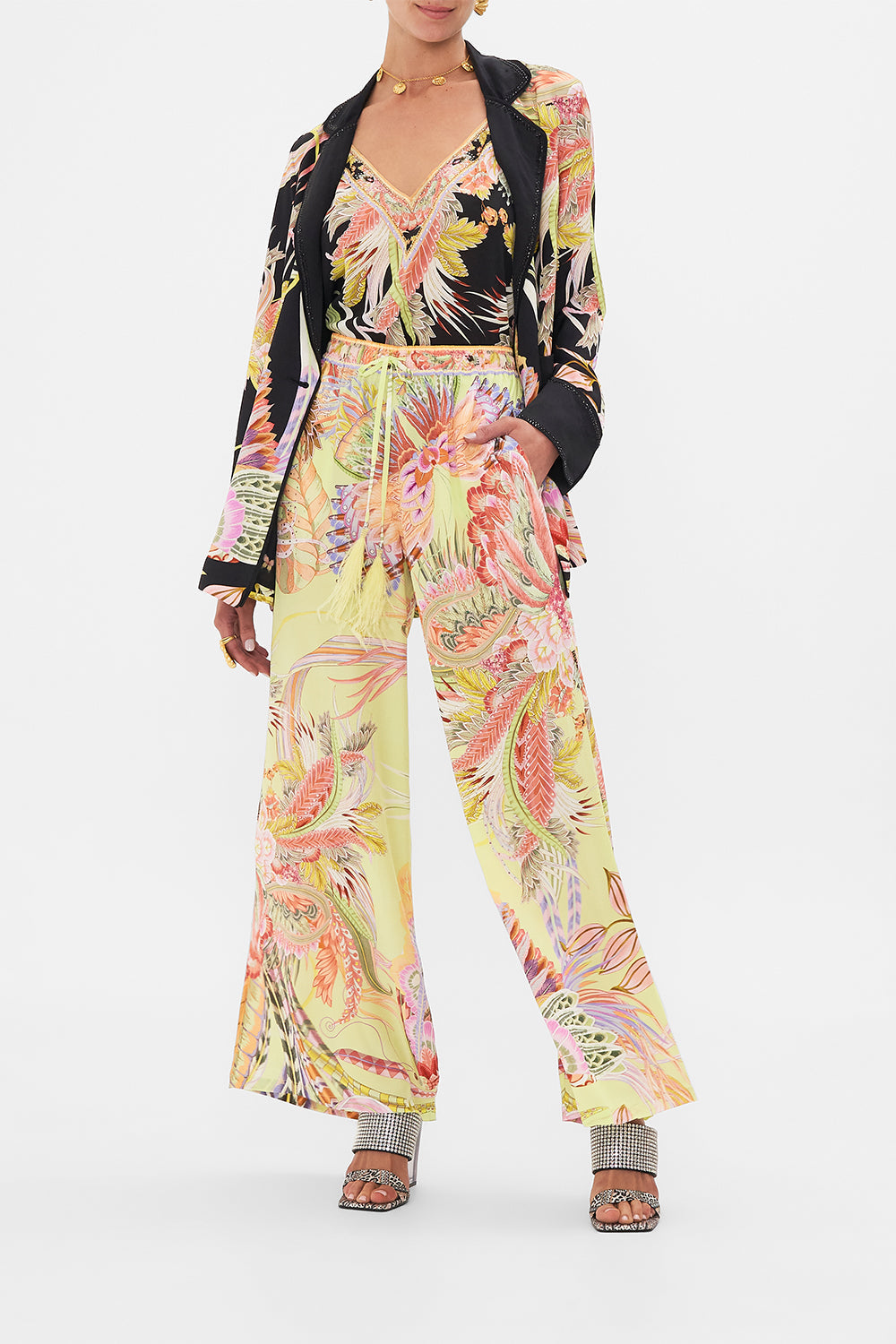 Crop view of model wearing CAMILLA silk pants Cosmic Tuscan print