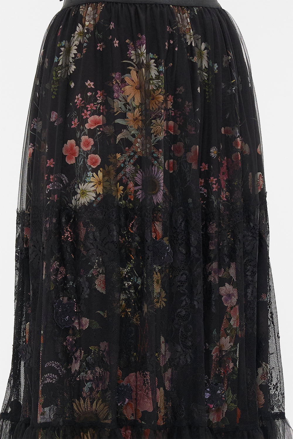 Detail view of model wearing CAMILLA ruffle skirt in Letters From A Vineyard print