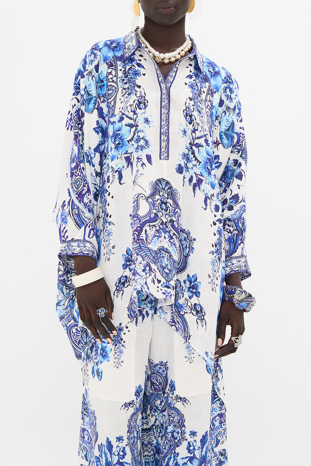 Crop view of model wearing CAMILLA silk top in Glaze and Graze print