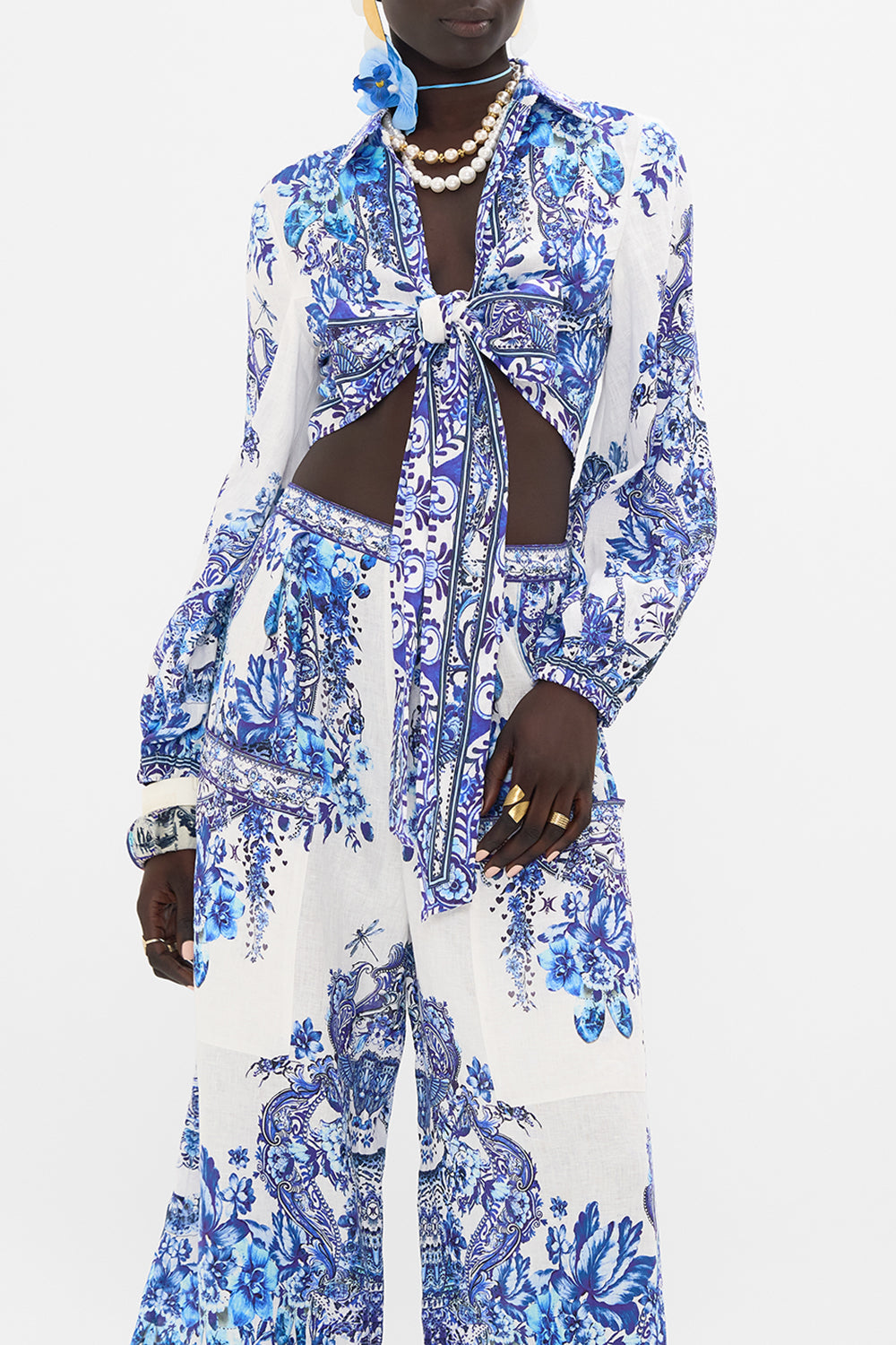 Crop view of model wearing CAMILLA cropped wrap shirt in Glaze and Graze print