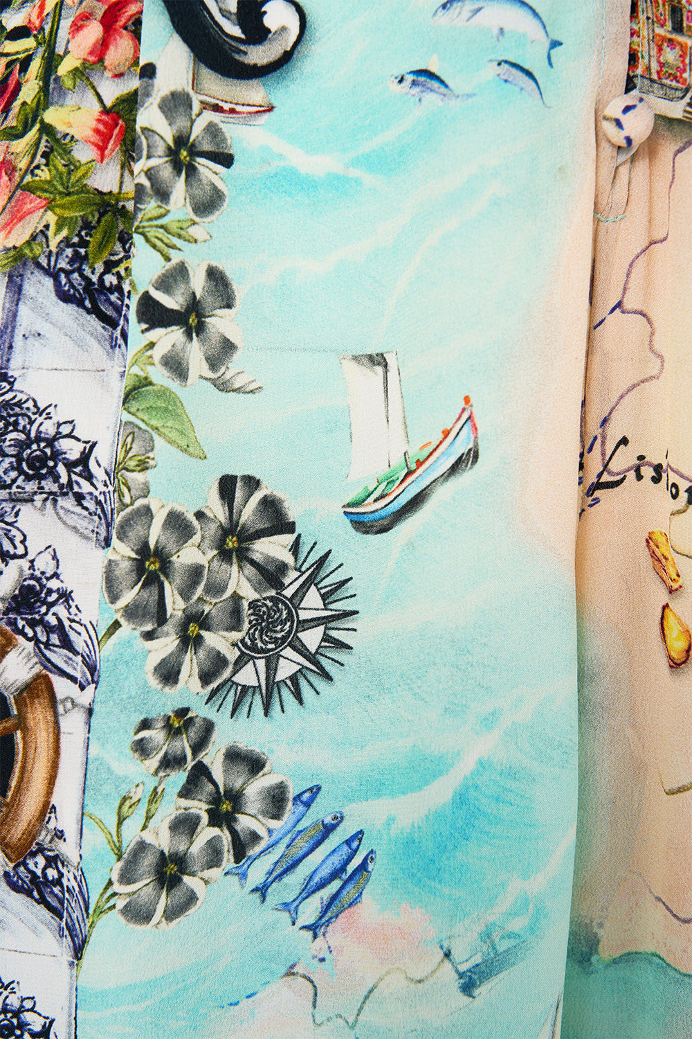 The CAMILLA Halterneck Jumpsuit With Tie Neck in our Folk Afloat print.