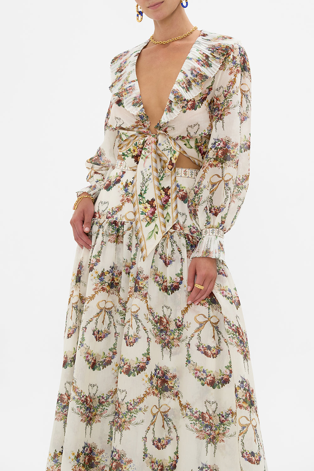 The CAMILLA Cropped Wrap Top With Pleated Detail in our Dressing Room Drama print.