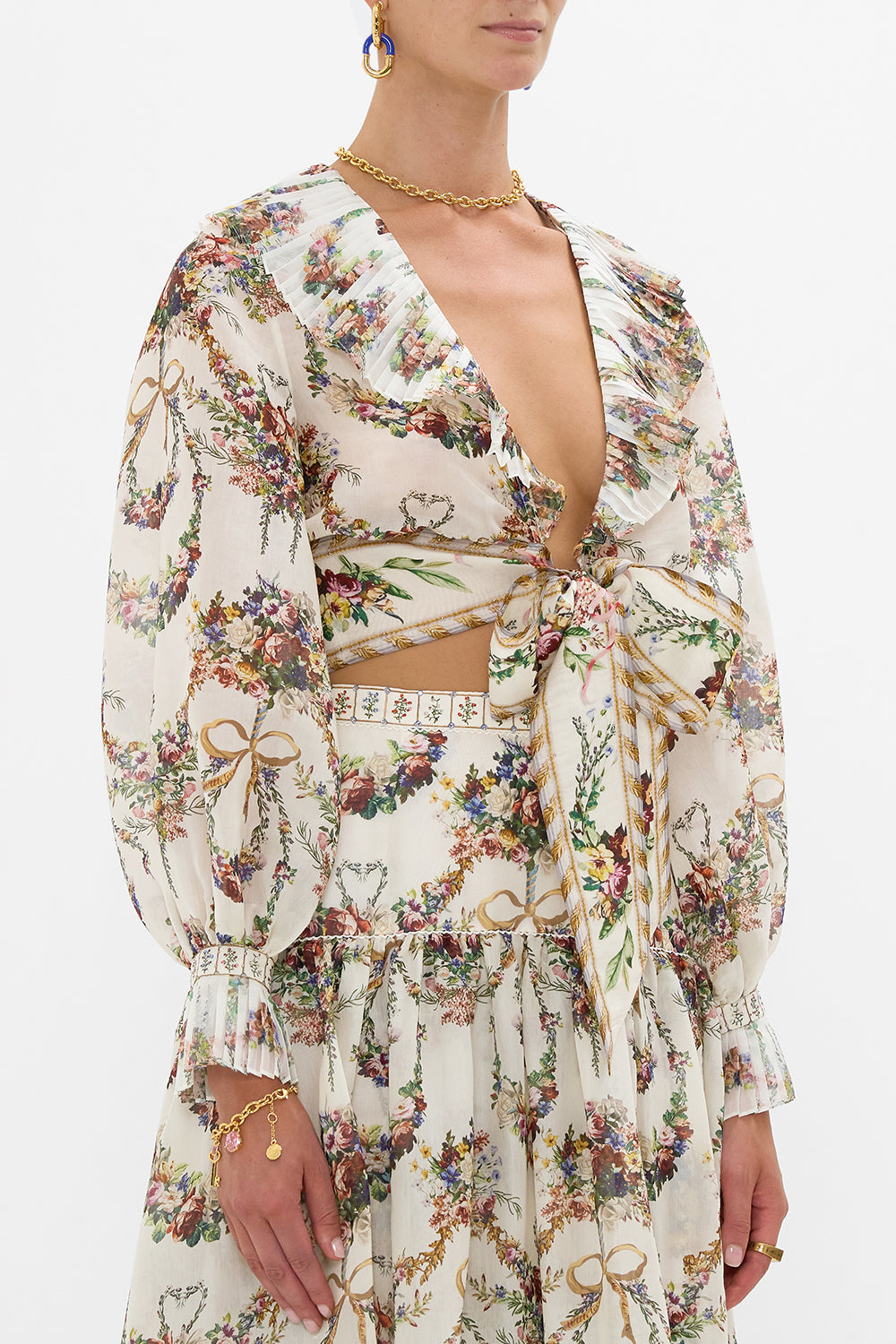 The CAMILLA Cropped Wrap Top With Pleated Detail in our Dressing Room Drama print.