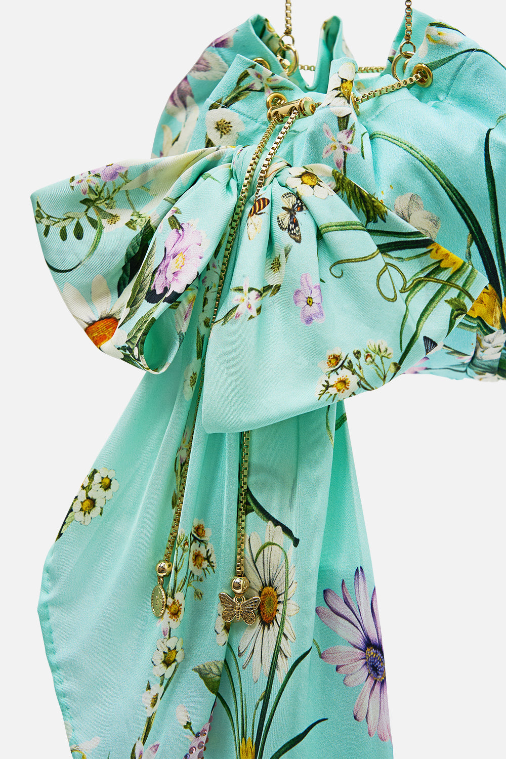 The CAMILLA Drawstring Pouch Bag With Oversized Bow in our Floral Freefall print.