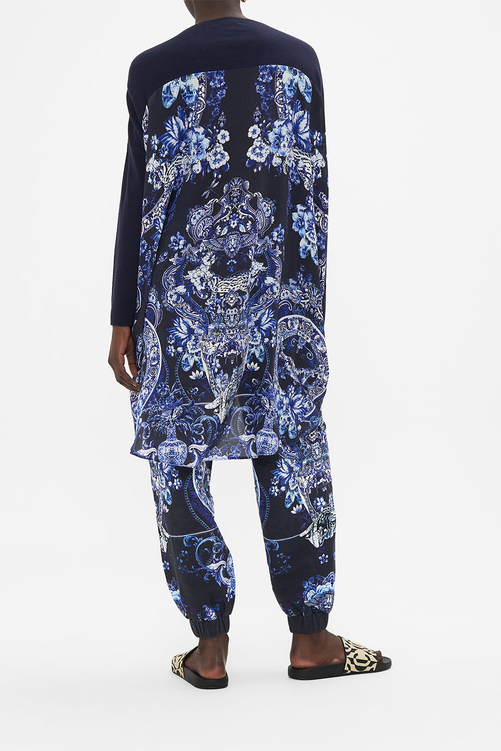 Back view of model wearing CAMILLA printed jumper in Delft Dynasty print 