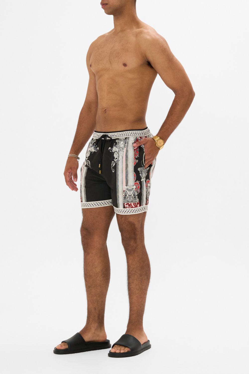 The CAMILLA MID LENGTH BOARDSHORT MARK OF MEDUSA in our  print.