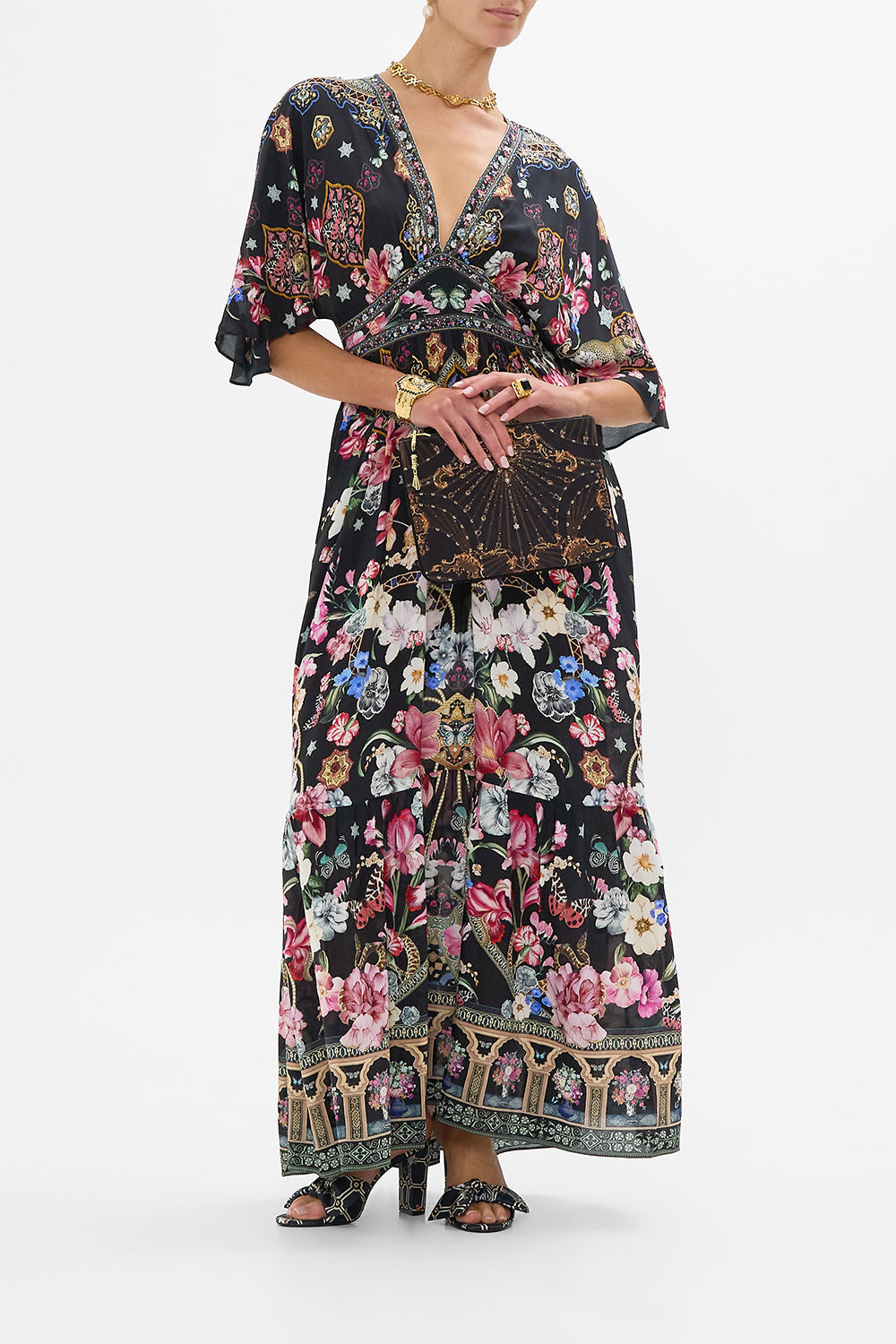 The CAMILLA SMALL CANVAS CLUTCH BAROQUE AROUND THE CLOCK in our  print.