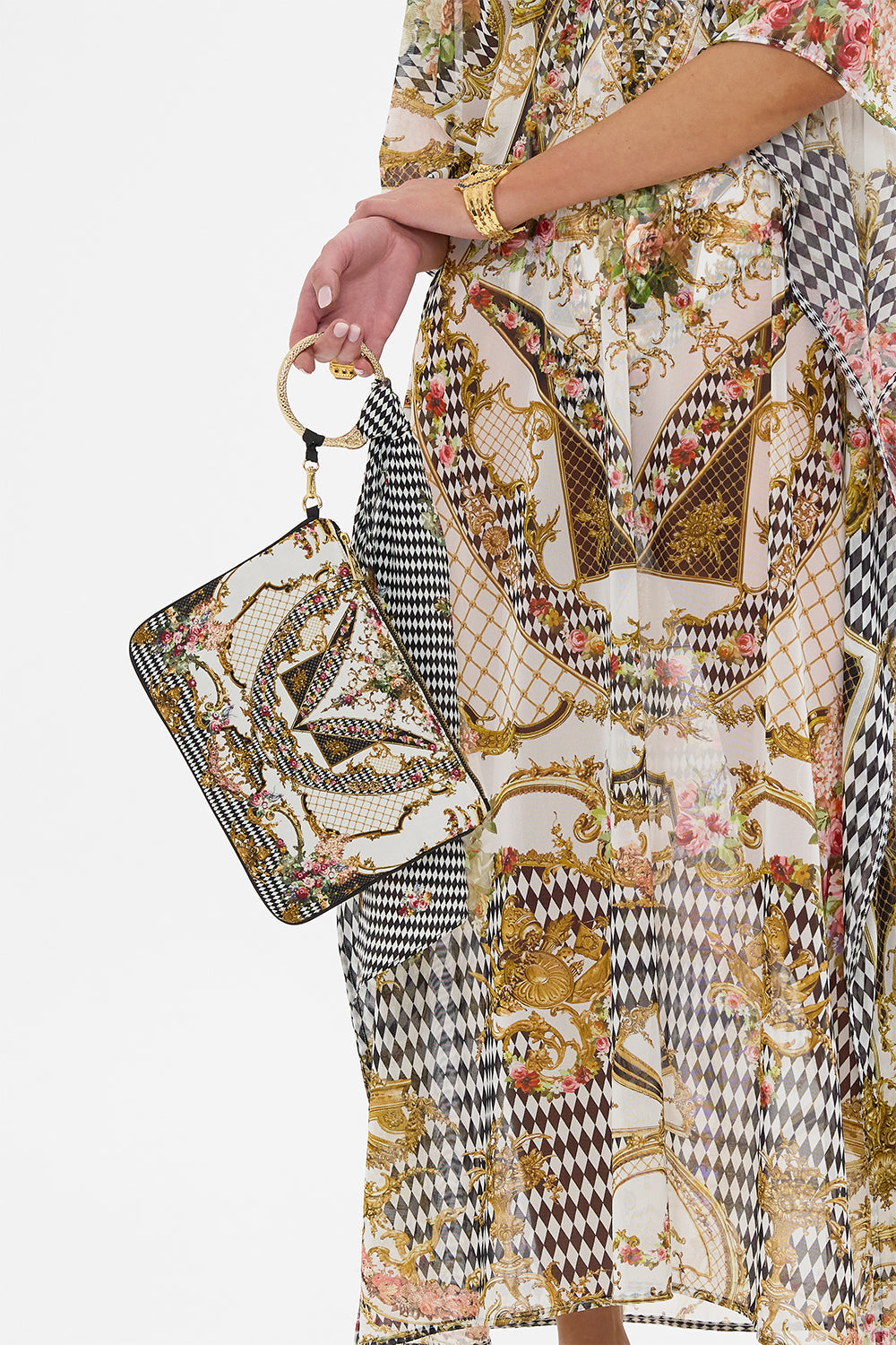 The CAMILLA RING SCARF CLUTCH ROCOCO GLOW in our  print.