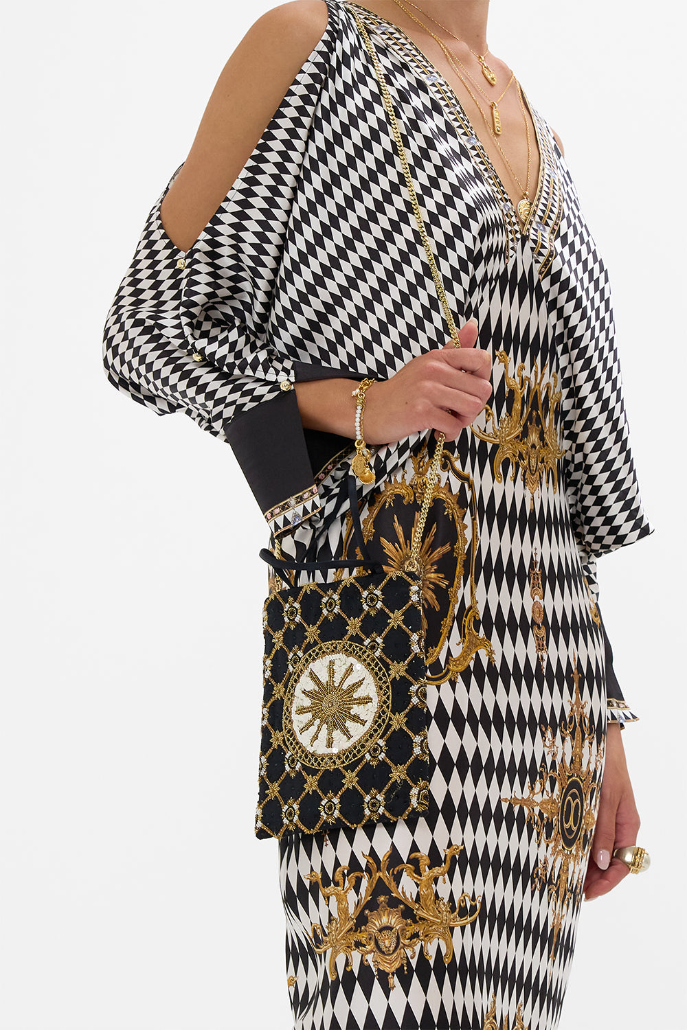 The CAMILLA EMBELLISHED MINI TOTE MONARCHY MANIA in our  print.