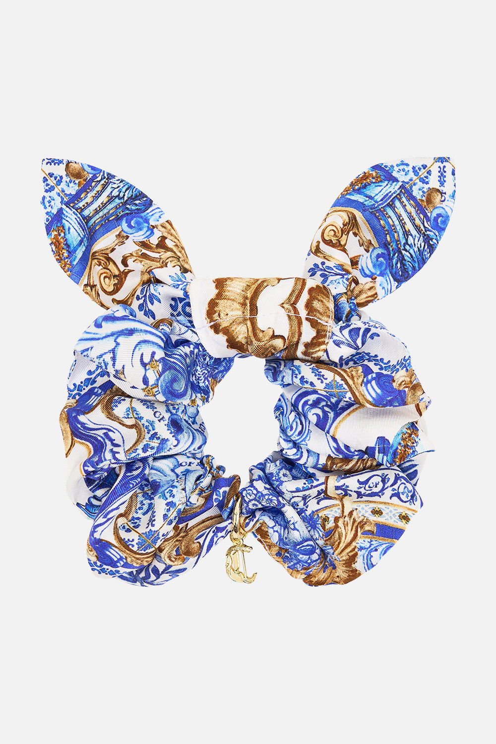 The CAMILLA SCRUNCHIE WITH TRINKET AZUL ADVENTURES in our AZUL ADVENTURES print.