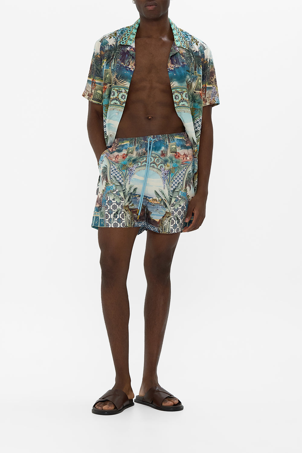 The CAMILLA MID LENGTH BOARDSHORT WITH ELASTIC WAIST POSTCARDS & PALM TREES in our  print.