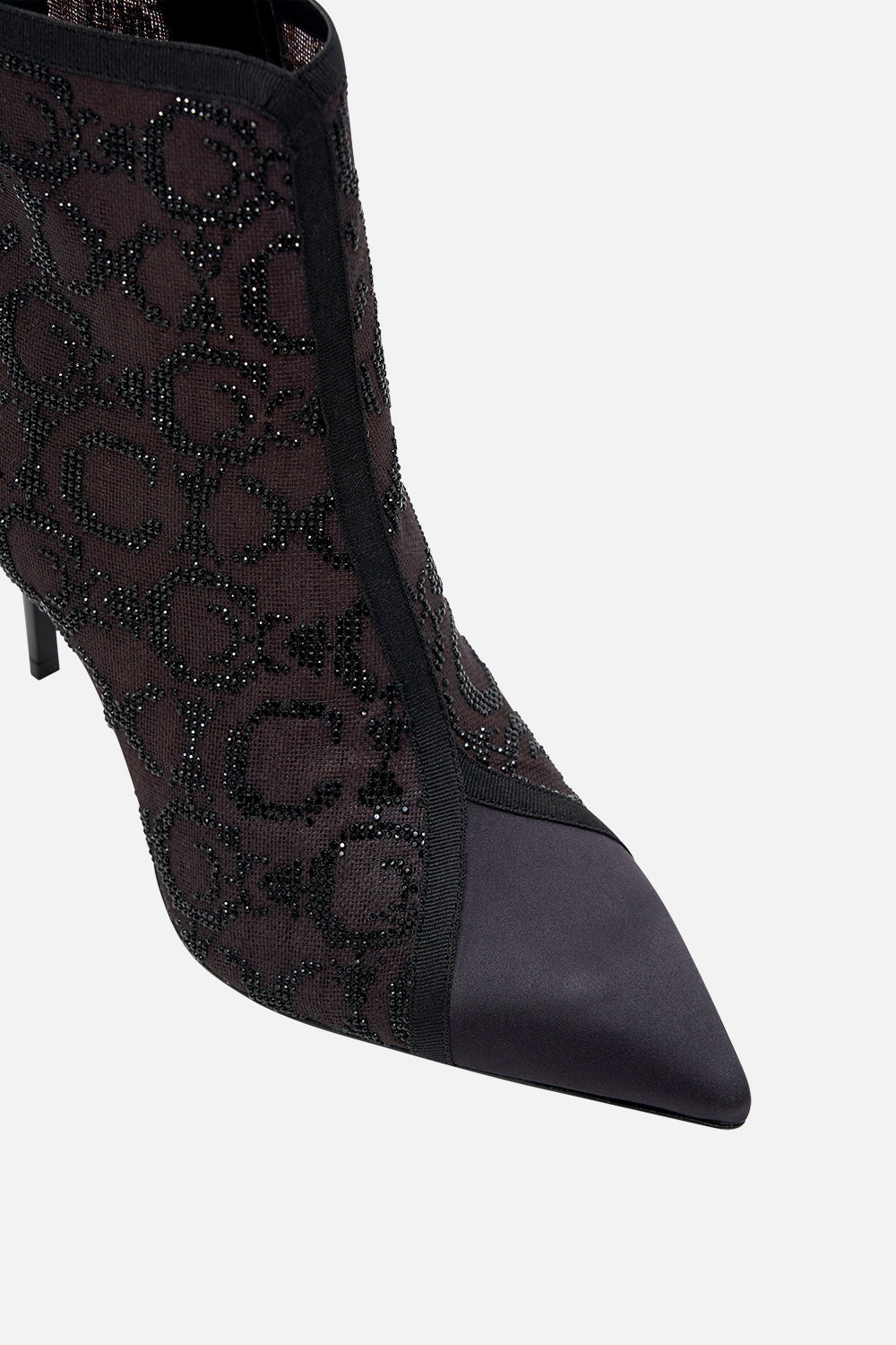 The CAMILLA NATALIE HEEL MESH BOOT SOLID BLACK in our  print.