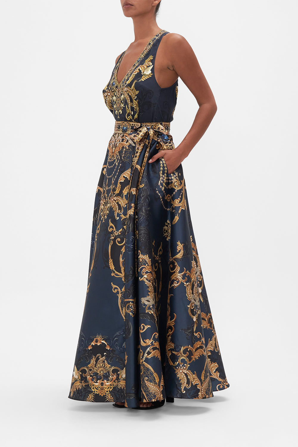Side view of model wearing CAMILLA taffeta maxi skirt in Moonlight Melodies print