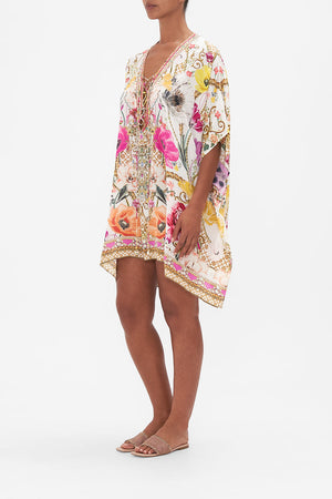 Side view of model wearing CAMILLA silk kaftan in floral in Destiny Calling print 